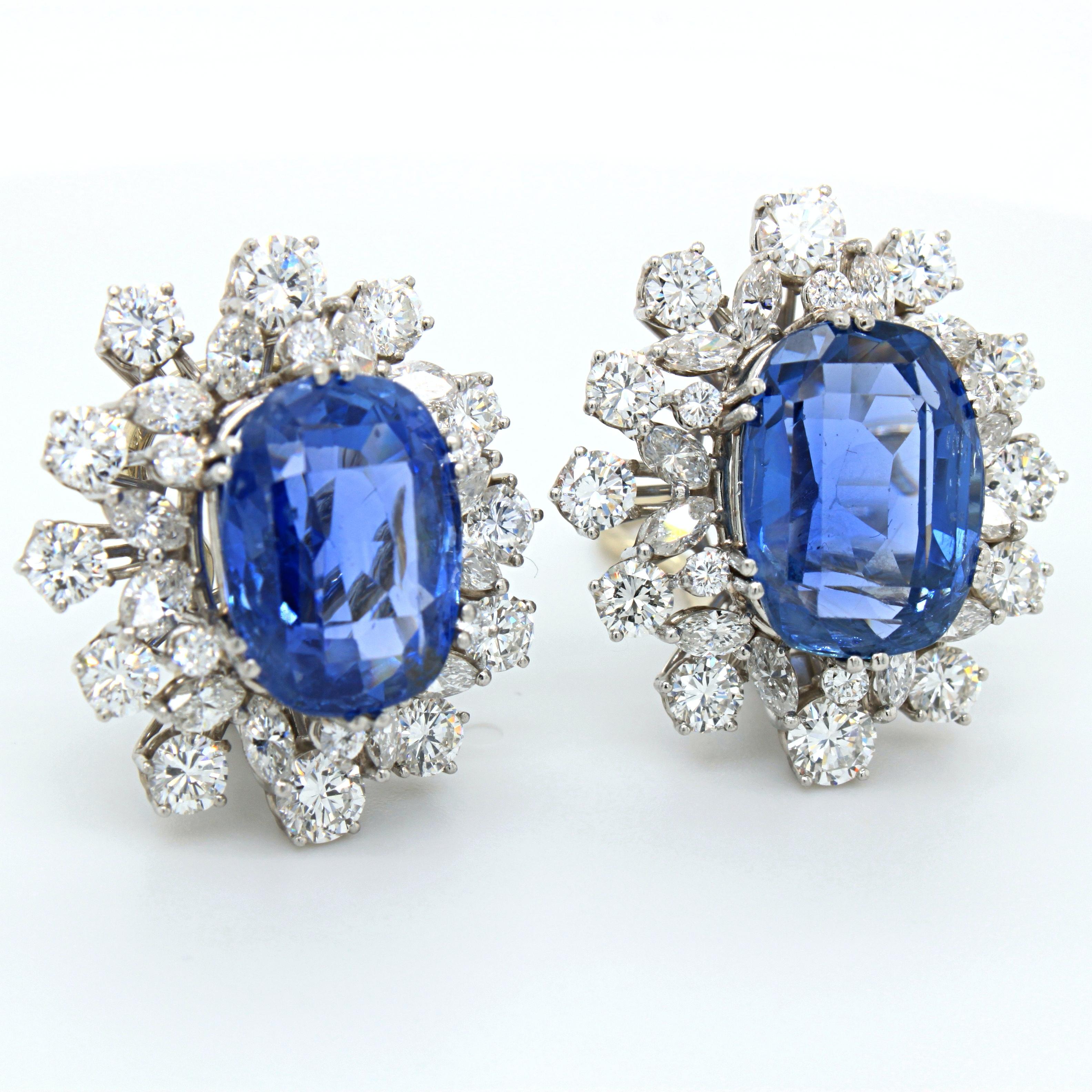 A pair of sapphire and diamond earrings in platinum, ca. 1970s. The cushion shaped sapphires are of Ceylon origin, natural and not heat treated, accompanied by a gemological certificate. They exhibit a classical Ceylon blue colour and have a