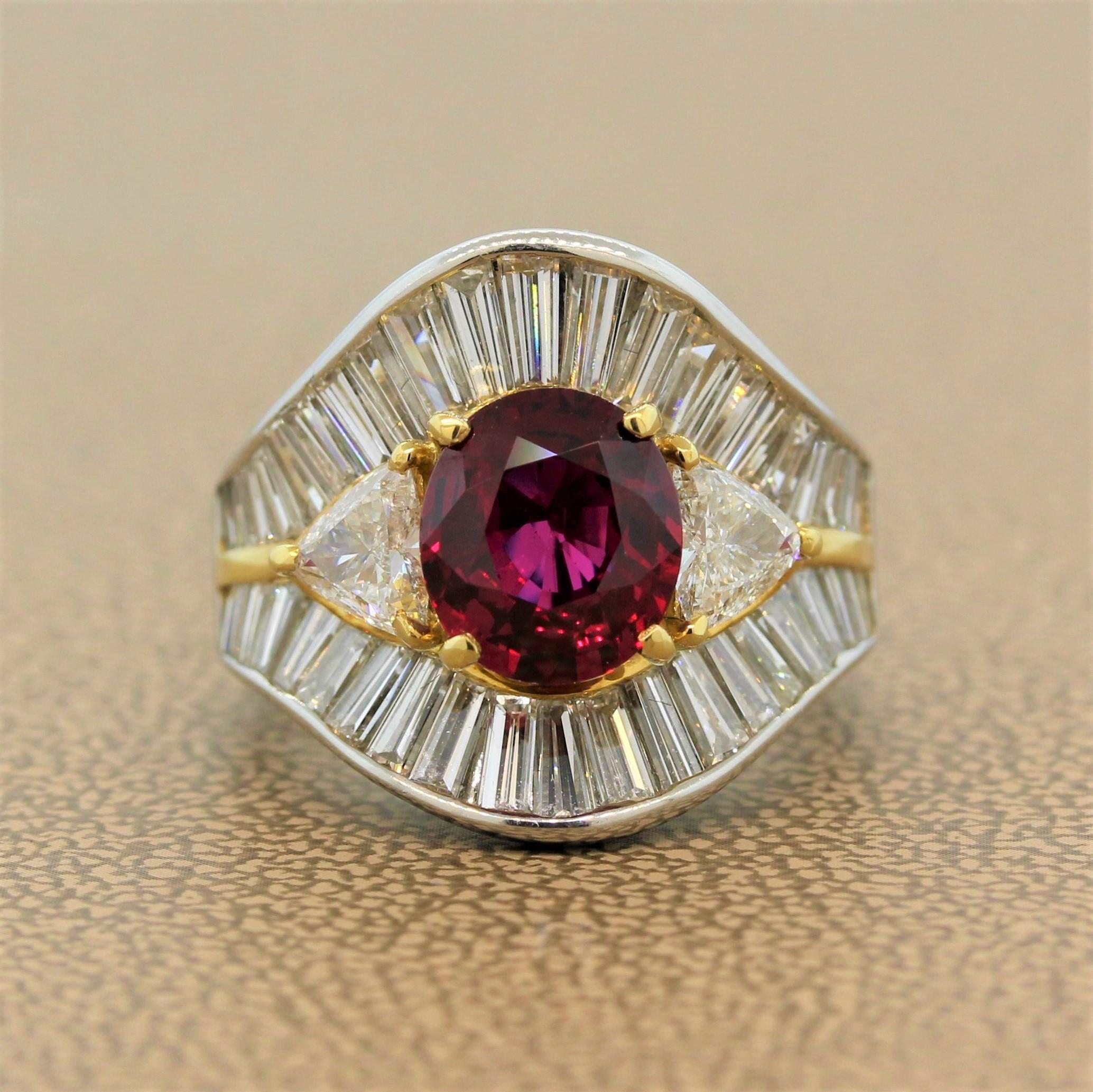 A GIA certified unheated 2.53 carat ruby in an 18K yellow gold setting is the feature of this gorgeous ring. This is possibly the finest ruby we have encountered, heated or unheated. Loup clean, the ruby is pure color, fire and love. It is accented