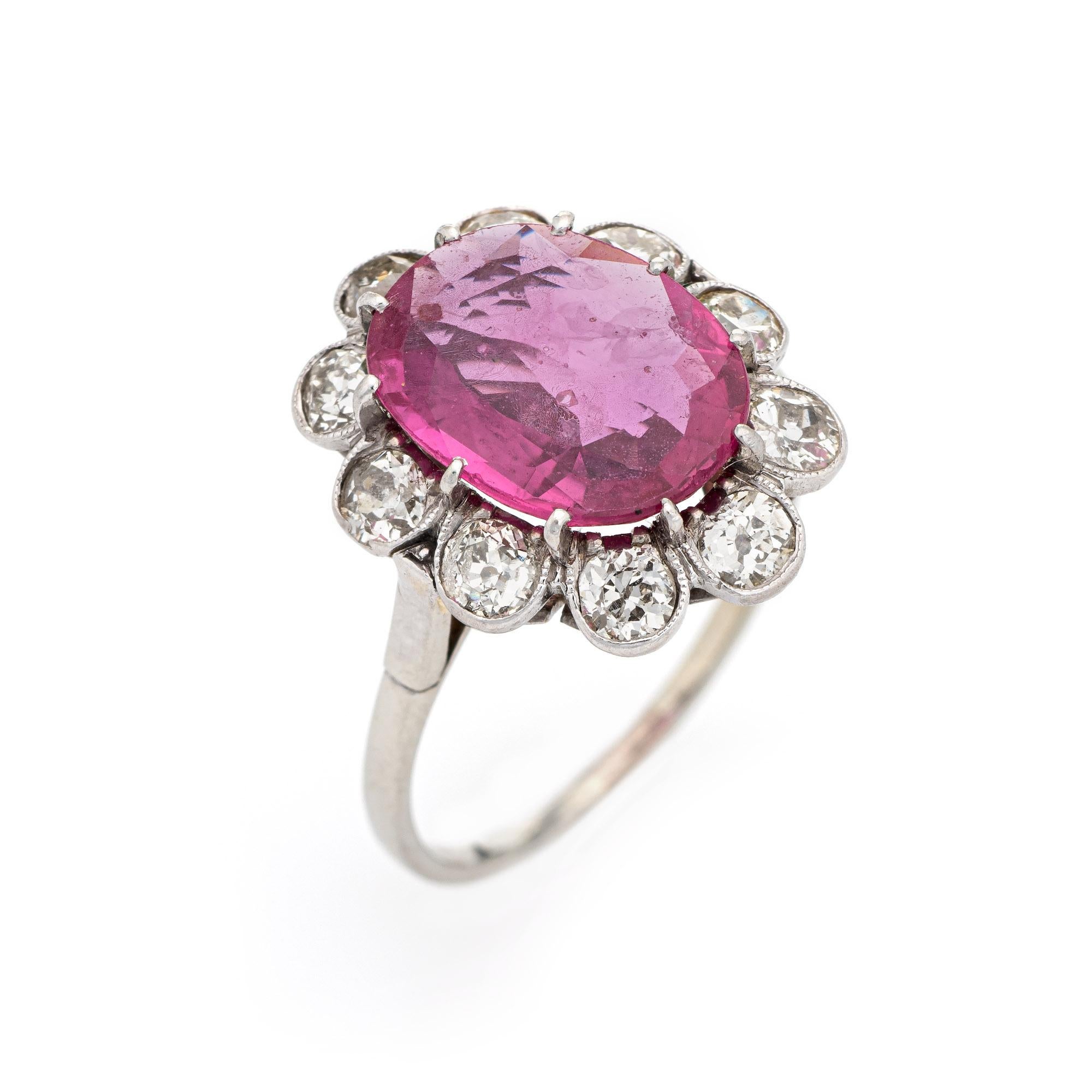 Elegant & finely detailed Art Deco era no heat pink sapphire & diamond ring (circa 1920s to 1930s) crafted in 14k white gold. 

Centrally mounted oval shaped mixed cut natural pink sapphire, approx. 2.70ct (11.67 x 8.83 x 2.86mm) light medium pink