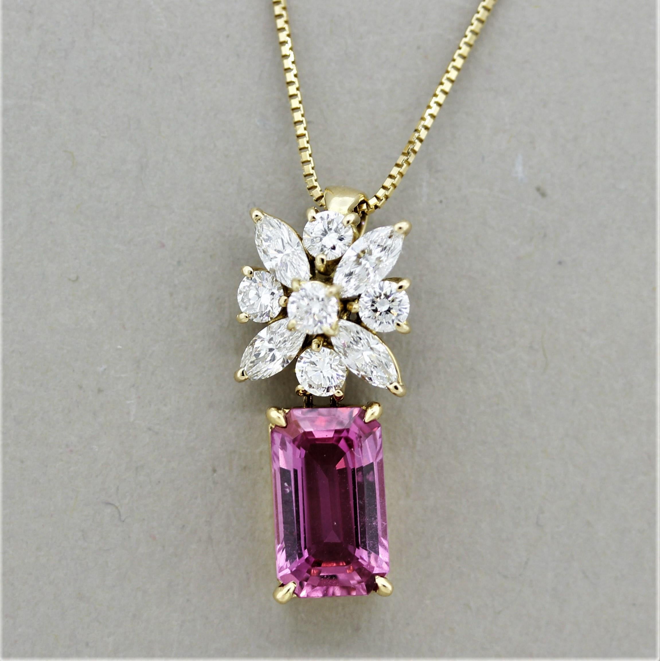 A superb emerald-cut pink sapphire takes center stage! It weighs 2.76 carats and has a bright fine vivid pink color. Adding to that, the sapphire is certified by the GIA as natural with no treatments, something very rare for a sapphire of this color