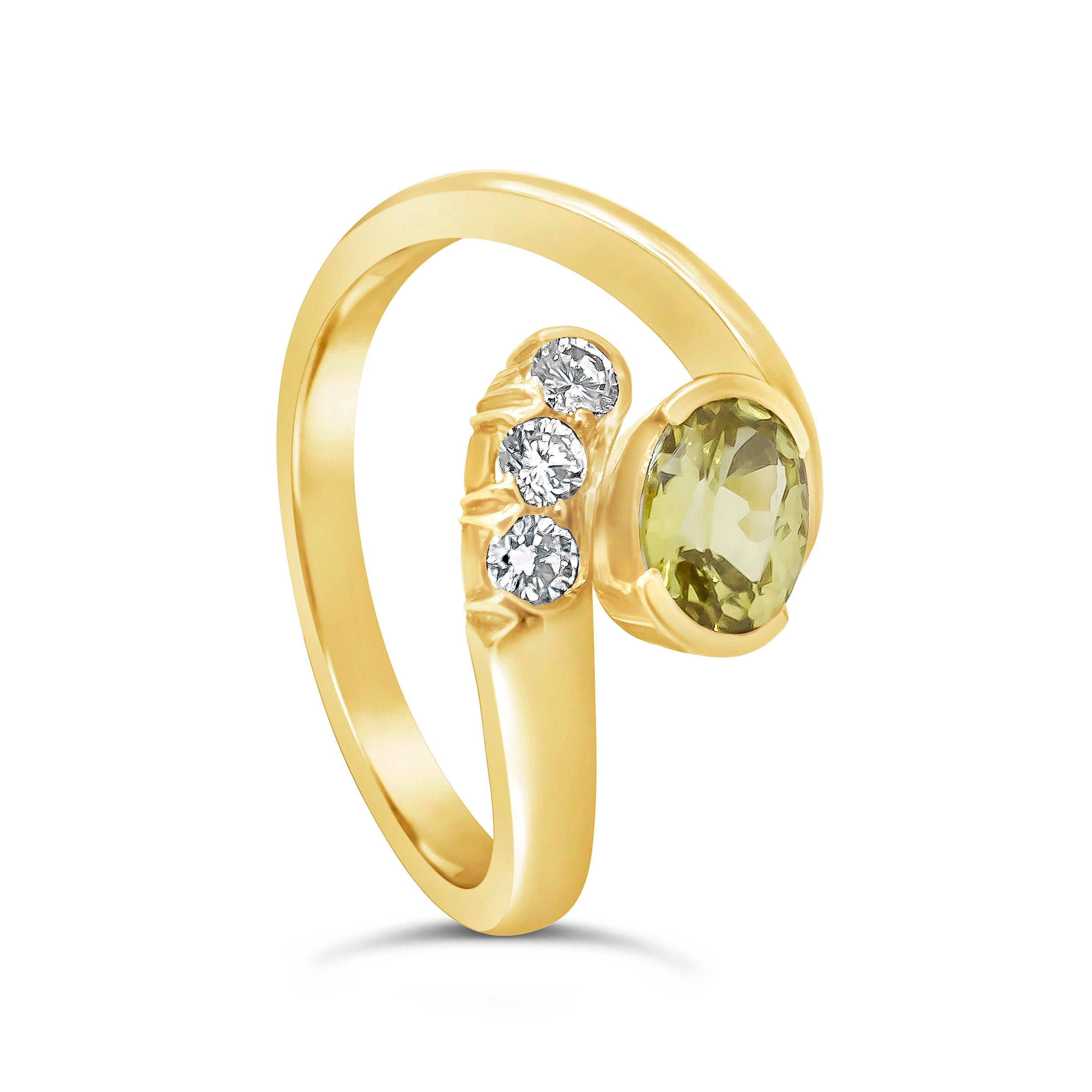 Showcasing a gorgeous 0.95 carat oval cut no heat yellow sapphire, accented with three round brilliant diamonds. Set in a bypass setting made in 18 karat yellow gold.

Style available in different price ranges. Prices are based on your selection.