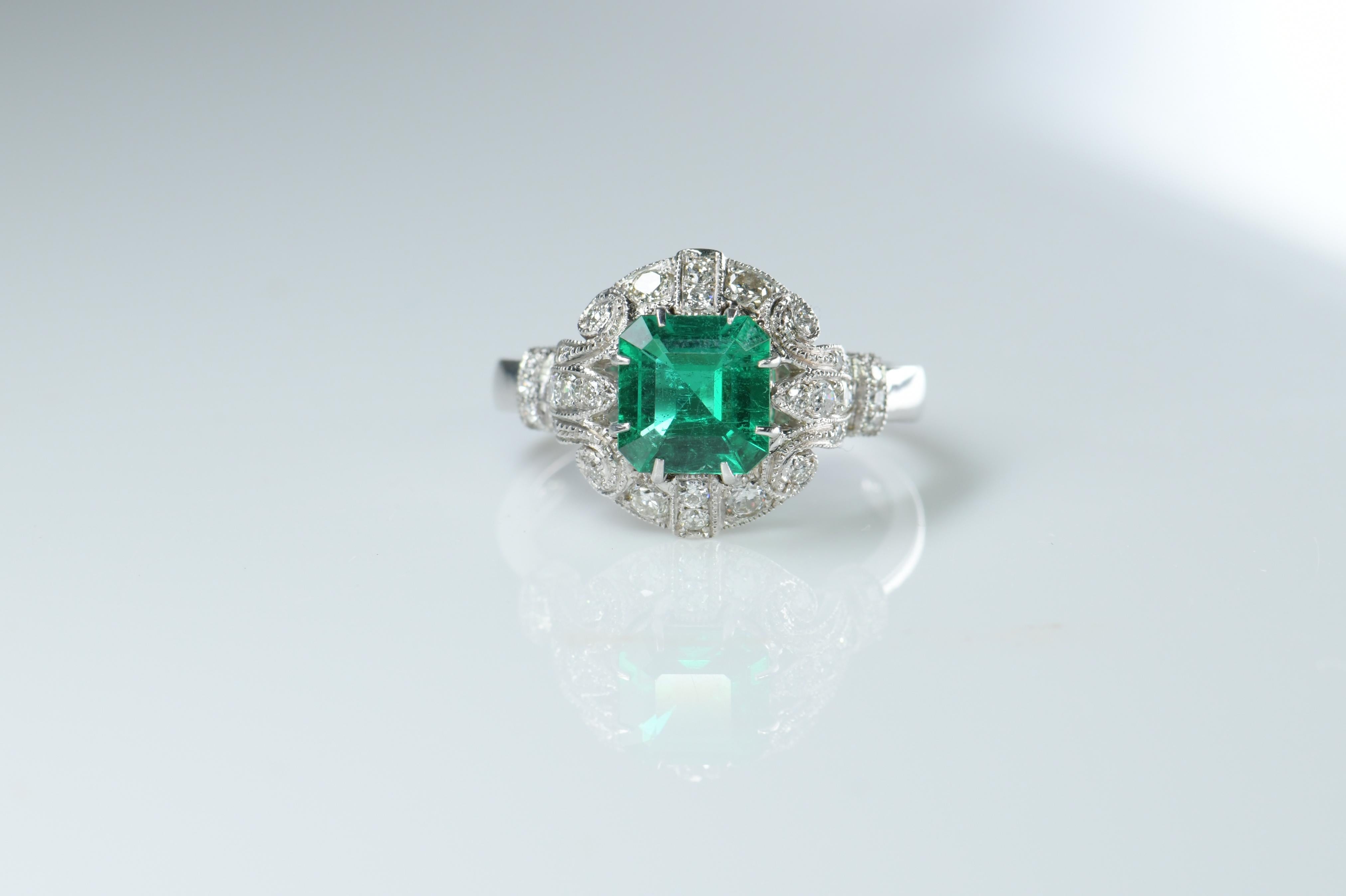 A gem-quality gorgeous emerald-cut emerald ring.  weighing 1.16 carats that AGL certified as Green color with no indication of treatment being done on the stone.

Emerald:  1.16ct  origin: Colombia no oil gem-quality. 
Weight: 4.9g
Eye clean and