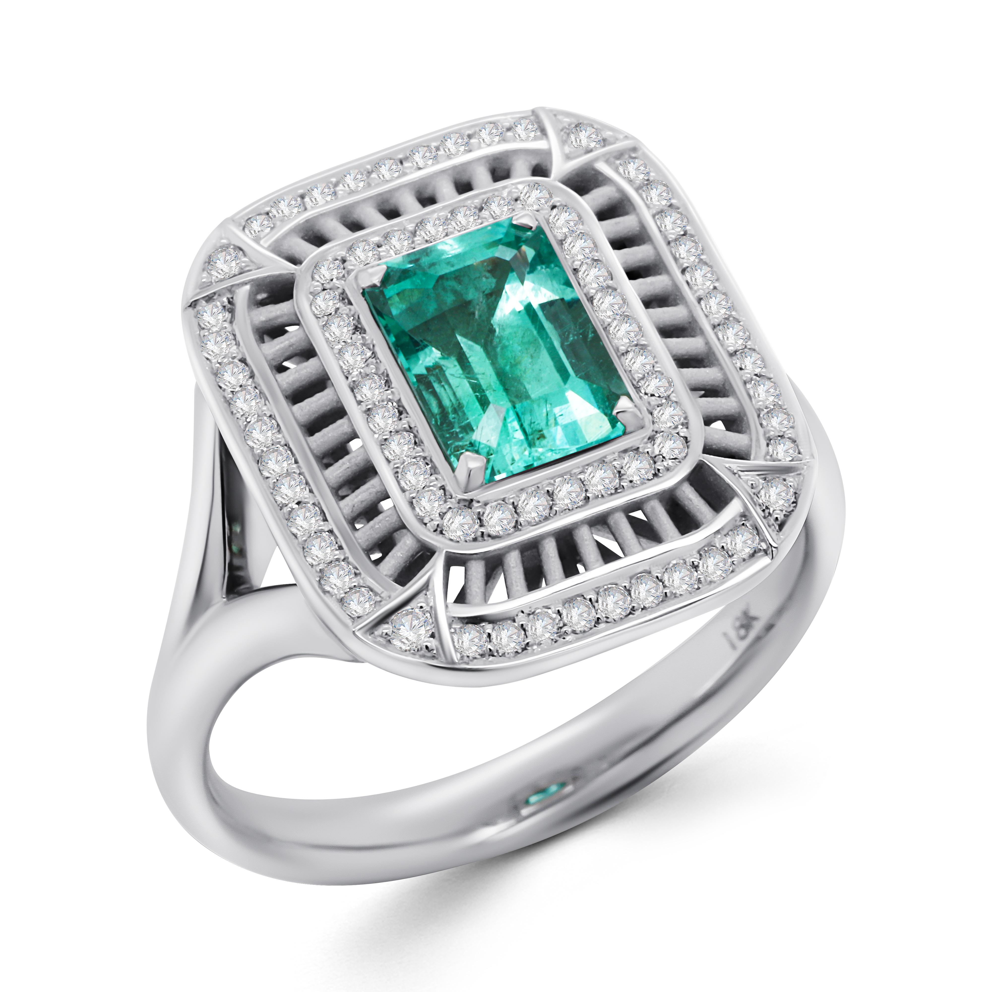 Ein zeitloses Design, das nie langweilig wird und auch nach Jahren noch stilvoll ist. 
Der Ring mit einem Smaragd in der Mitte und zwei Reihen von Diamanten. Der Smaragd stammt aus dem Uralgebirge in Russland, das für seine seltenen Vorkommen an
