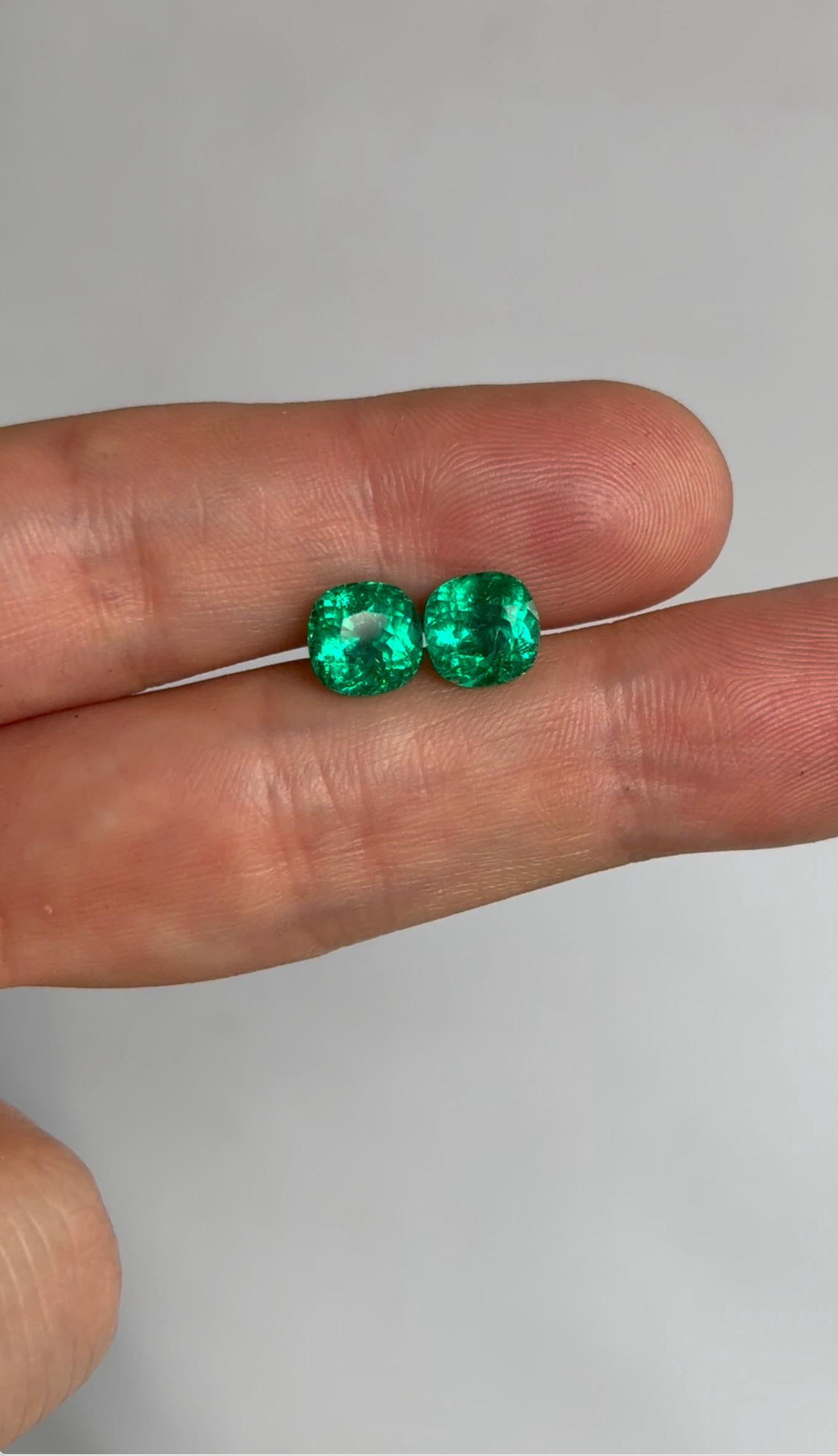 This perfectly matched pair of Colombian cushion-cut emeralds, totaling 5.16 carats, is a rare and collectible find. Both stones are Gübelin-certified and carry 