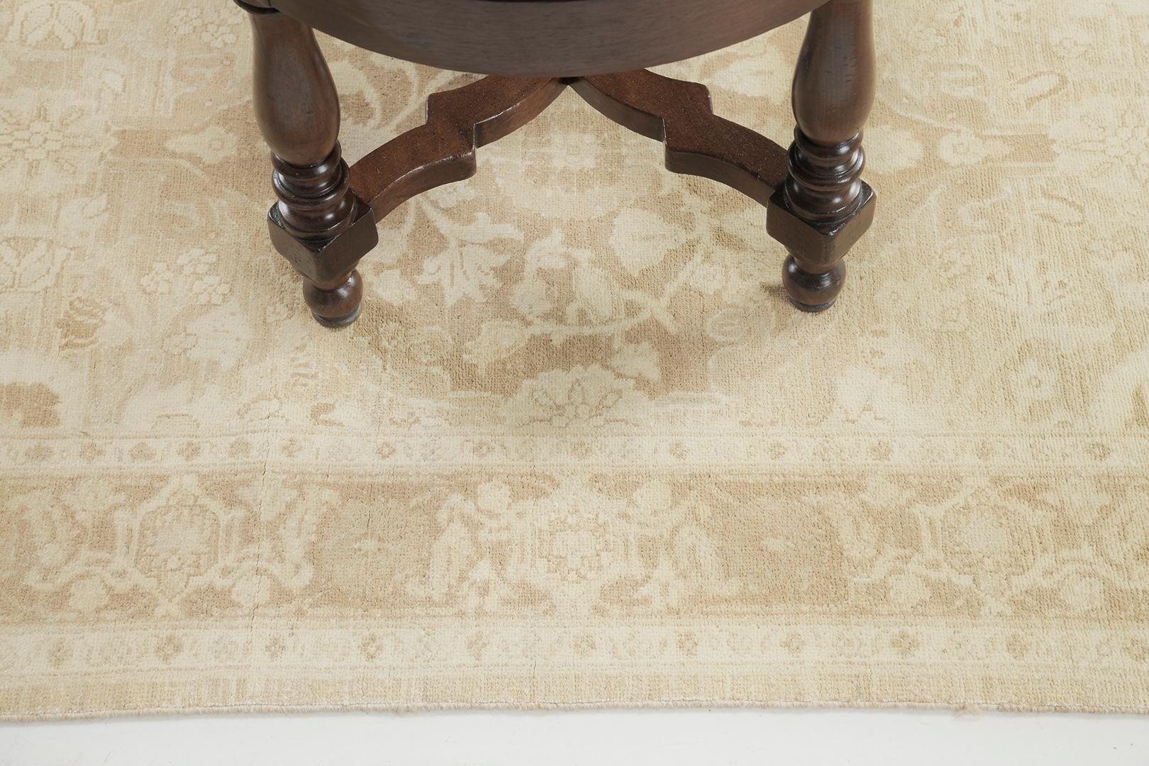 A gorgeous shade of natural sands and tan, the scrolling vinery issuing foliage formed grandiose medallions is delicately woven at the heart of the rug. A masterpiece that suits your traditional and modern interior. This Tabriz Rug shows a stunning