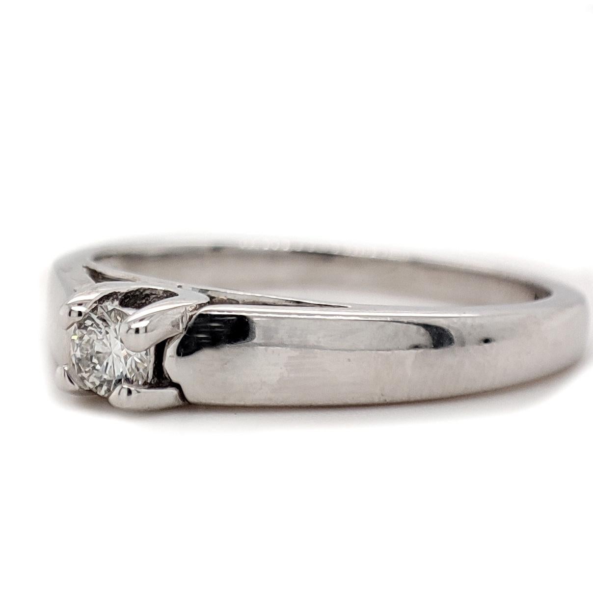 FOR US CUSTOMER NO VAT!

Embark on a journey of everlasting love with this enchanting 0.32CT E, VS1 Solitaire Engagement Diamond Ring. Meticulously crafted in 14K White Gold, the ring weighs a substantial 2.84 grams, ensuring both elegance and