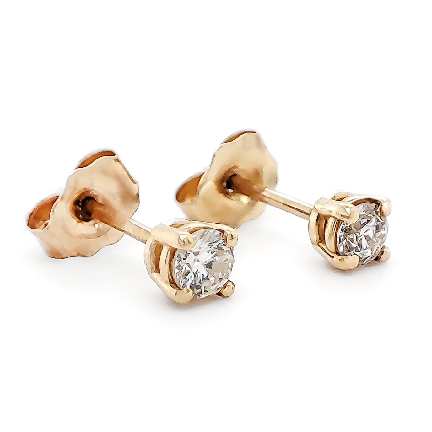 FOR U.S. BUYERS NO VAT 

If you want to add color to any style you choose, these 14kt diamond stud earrings weighing 0.53 grams are definitely for you. These gorgeous earrings feature two round brilliant cuts set in 14kt Yellow gold totaling 0.18