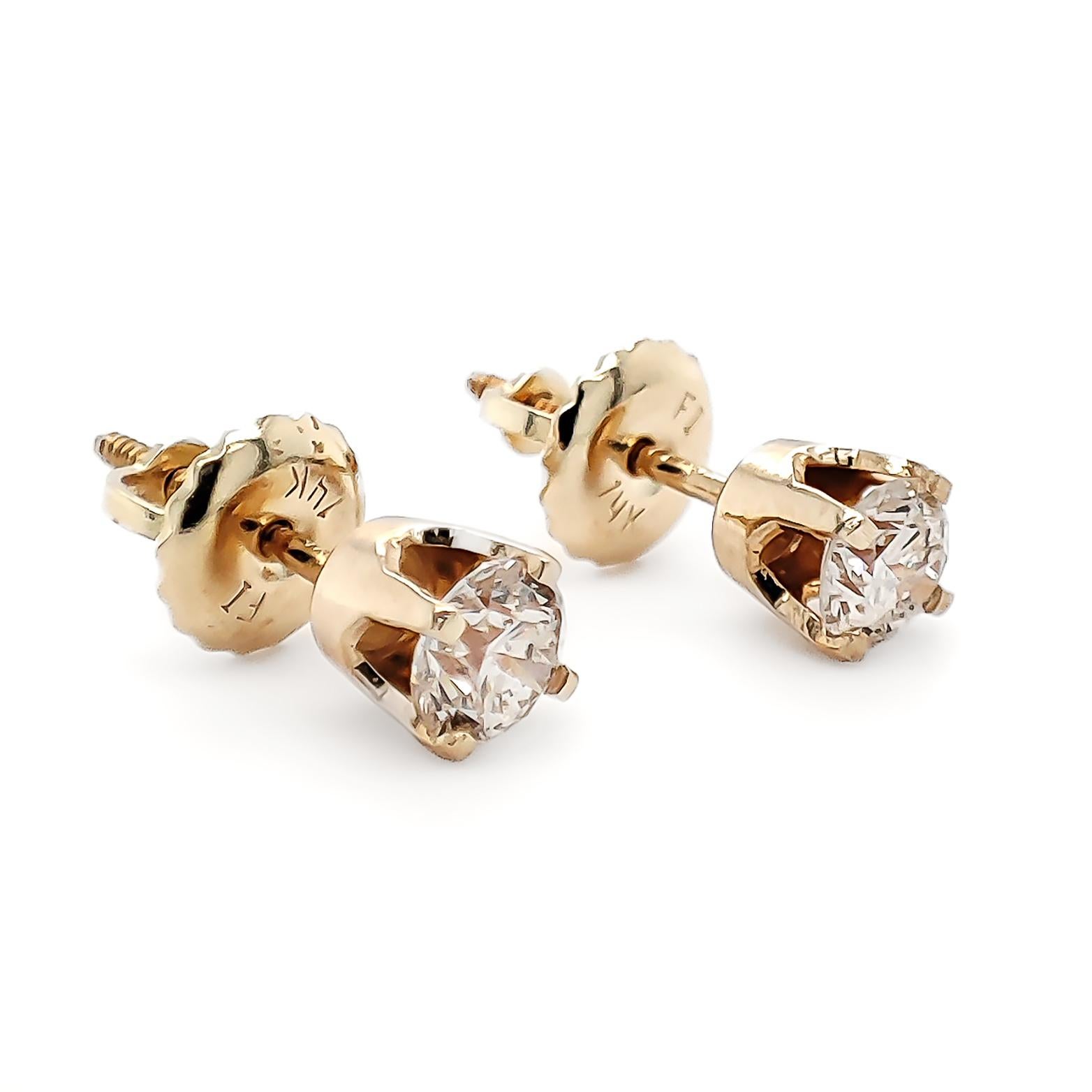 FOR U.S. BUYERS NO VAT 

If you want to add color to any style you choose, these 14kt diamond stud earrings weighing 0.79 grams are definitely for you. These gorgeous earrings feature two round brilliant cuts set in 14kt Yellow gold totaling 0.50