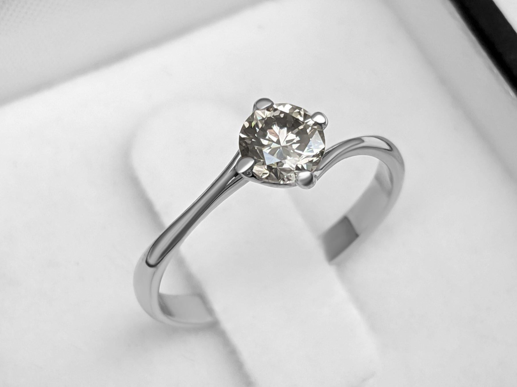 Ring can be sized free of charge prior to shipping out.
Ring size: 52 (EU) / 12 (IT) / 6 (US) 

Center Stone:
___________
Natural Diamond
Cut: Round Brilliant
Carat: 0.51 carat
Color: Fancy Deep (AA) Gray
Clarity: SI1

Metal weight: 1.48 gr.

Item