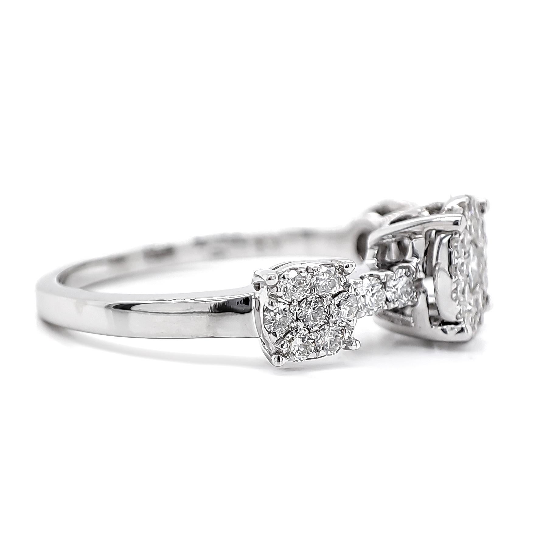 FOR U.S. BUYERS NO VAT NO CUSTOMS FEES

This elegant ring features 46 dazzling diamonds, totaling 0.60 carats. The diamonds range in color from D to G and have exceptional clarity grades of VVS2 to VS2, ensuring remarkable brilliance and sparkle.