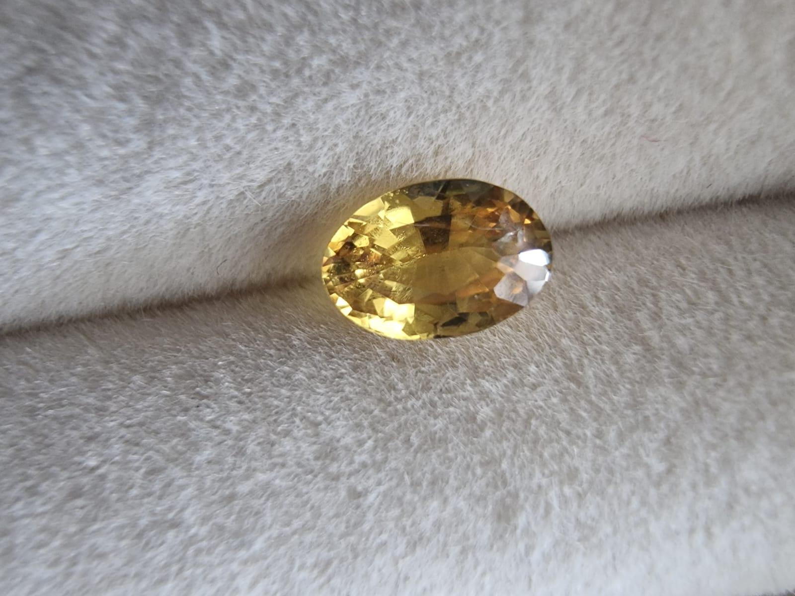 Brighten Your World with a Eye Clean 0.95ct Oval Cut Natural UNHEATED Yellow Sapphire Loose Gemstone. With its captivating yellow hue, this loose gemstone is a true treasure of nature, waiting to be transformed into a unique and dazzling piece of