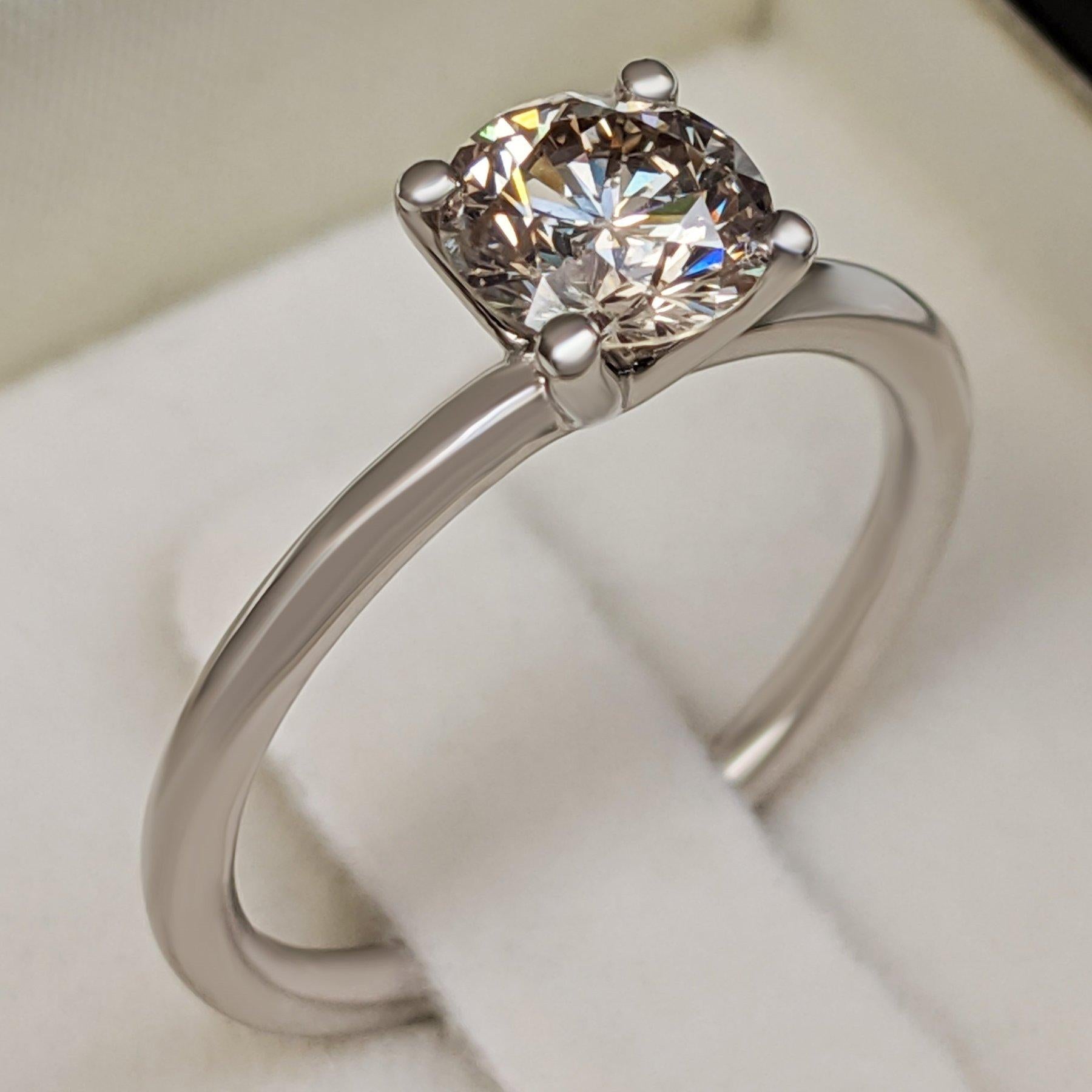 Ring can be sized free of charge prior to shipping out.
Ring size: 56 EU \  7.5 US

Center Stone:
___________
Natural Diamond
Cut: Round Brilliant
Carat: 1.06 carat
Color: J
Clarity: SI2

Item ships from Israeli Diamonds Exchange, customers are