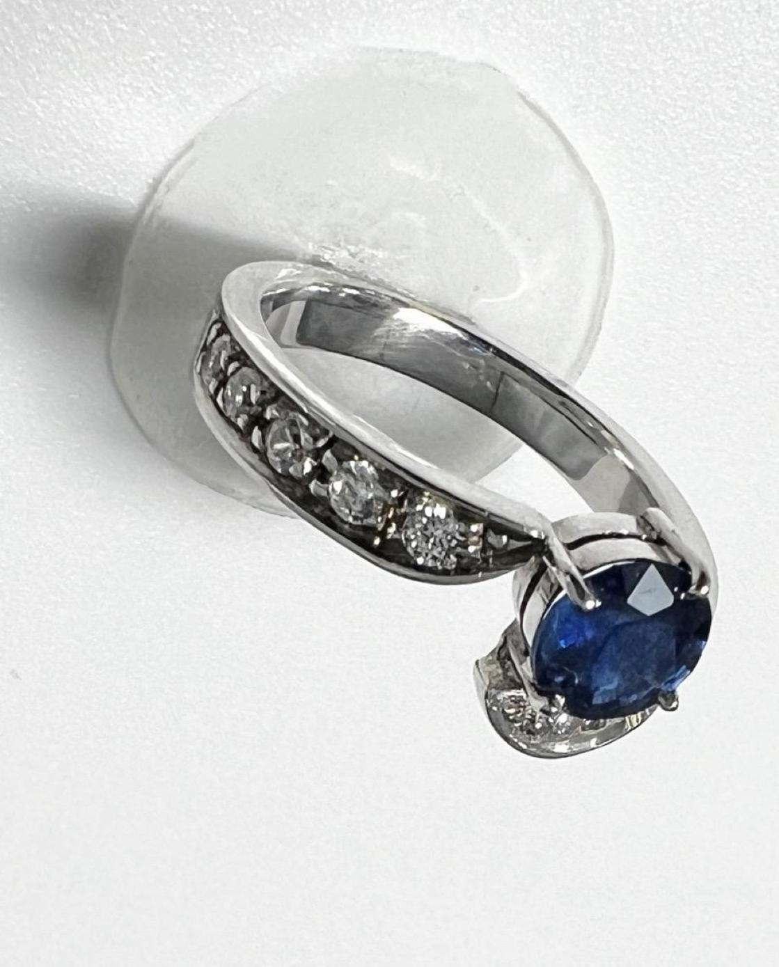 Elevate your love story with our enchanting 1ct Blue Sapphire Ring, surrounded by a shimmering halo of dazzling white sapphires on both sides. 

Key Features:
Adorned with a breathtaking 1ct blue sapphire, symbolizing loyalty, sincerity, and