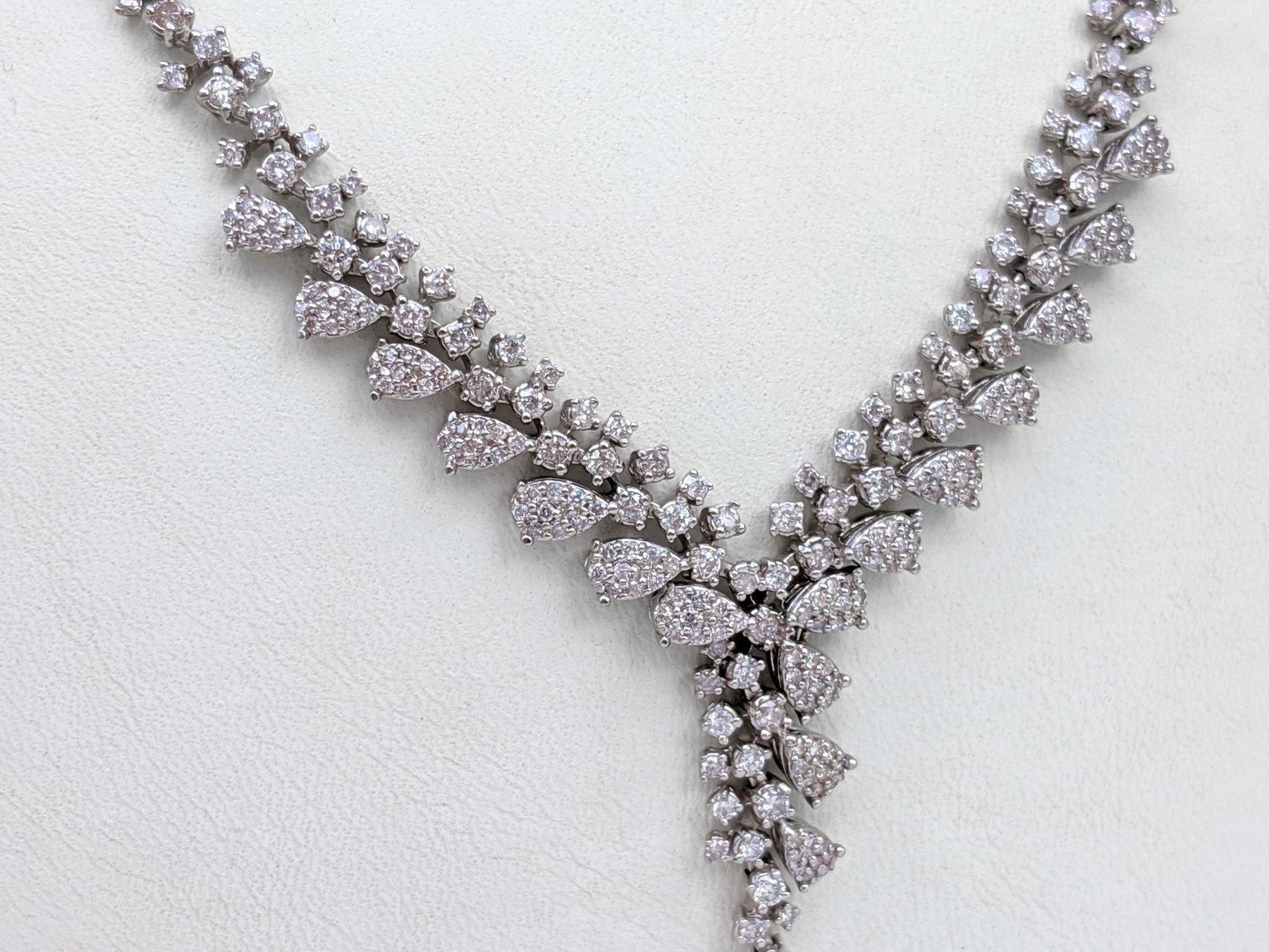 One of a kind magnificent light pink diamonds necklace, one of the rarest and most sought after colors in diamonds.
A perfect gift to yourself or your loved one.

Center Stones:
Natural Diamonds
Weight: 3.51 ct / 268 stones
Color: Light Pink - Fancy
