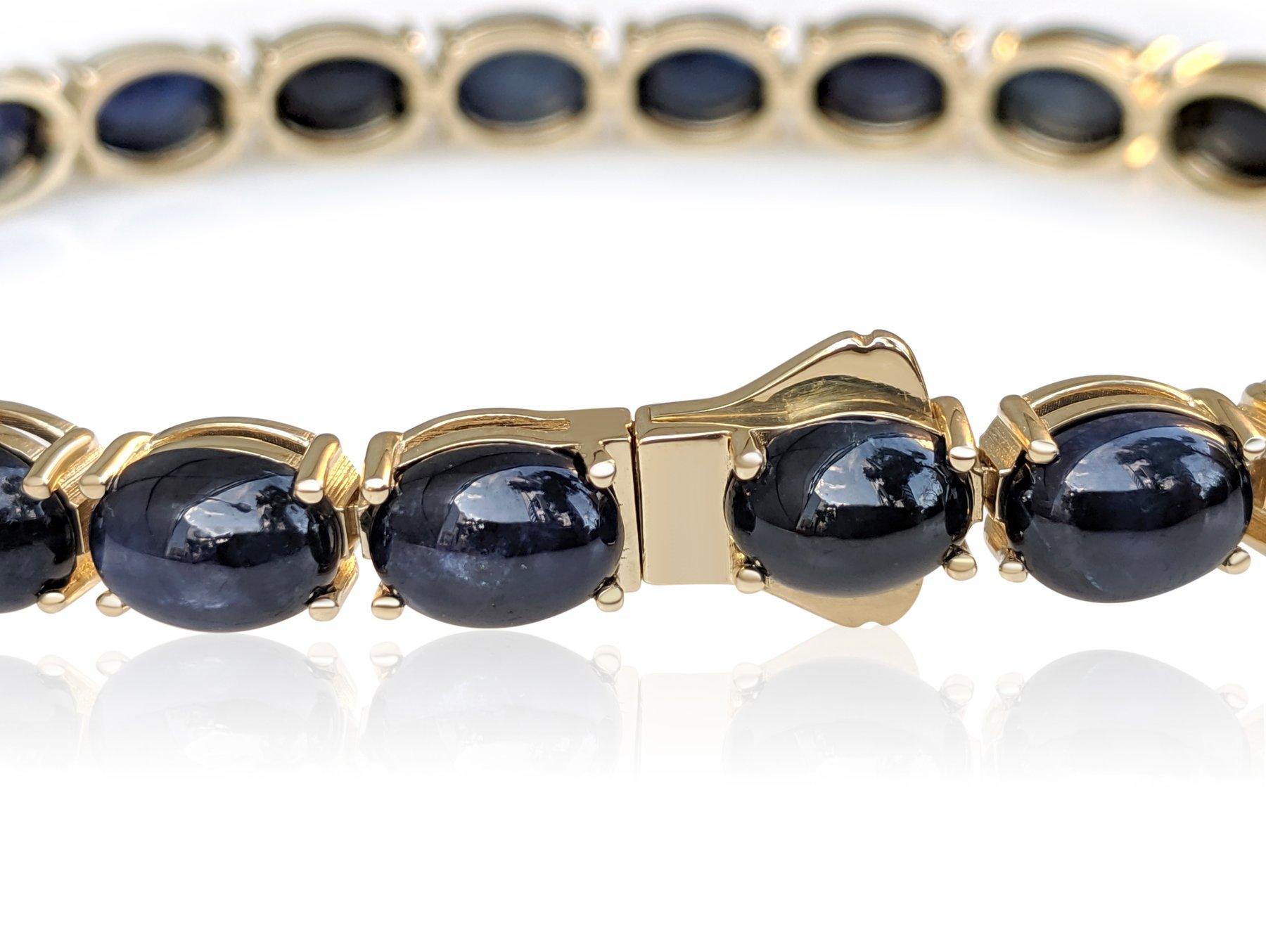 The bracelet will stand out in any occasion and is a wonderful gift for yourself or your loved one.

Size: 18 cm

Center Natural Sapphires:
Weight: 42.74 carat, 22 stones
Color: Blue
Shape: Oval Cabochon Cut

Item ships from Israeli Diamonds