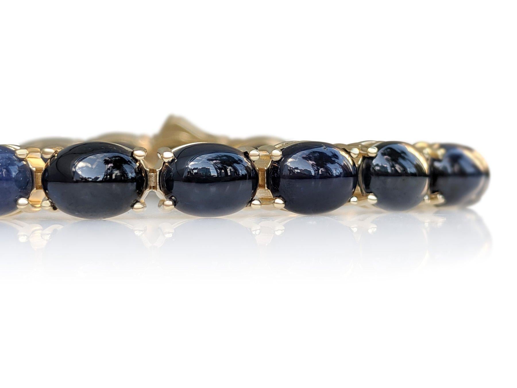 NO RESERVE! 42.74 Ct Sapphire Tennis Riviera - 14kt - Yellow gold - Bracelet In New Condition For Sale In Ramat Gan, IL