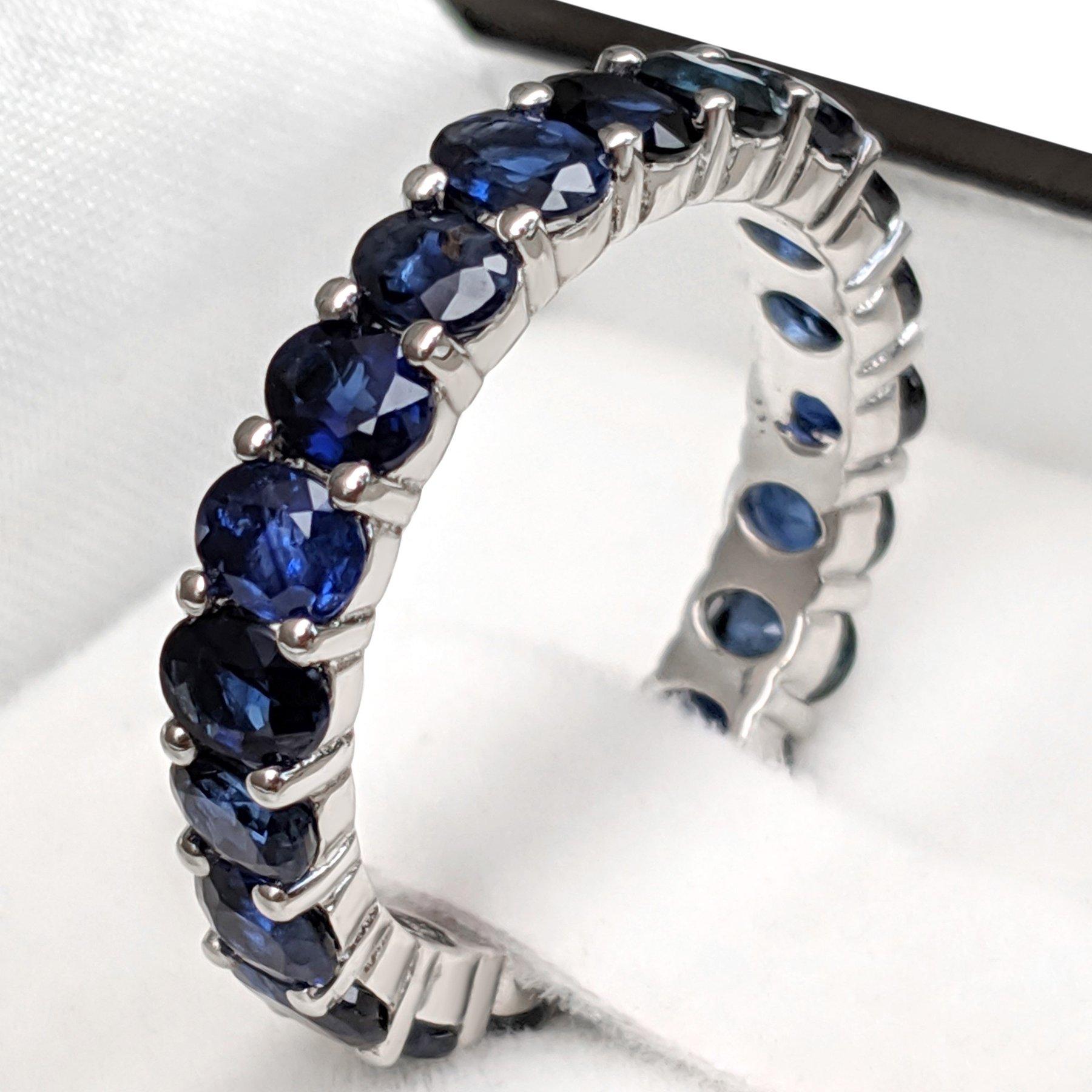 This ring is definitely a show stopper and will draw attention wherever you go! A great gift for yourself or your loved one - a heirloom piece to treasure forever!

Ring Size: 56 EU

Center Natural Sapphire:
Weight: 4.55 ct, 21 stones
Color: