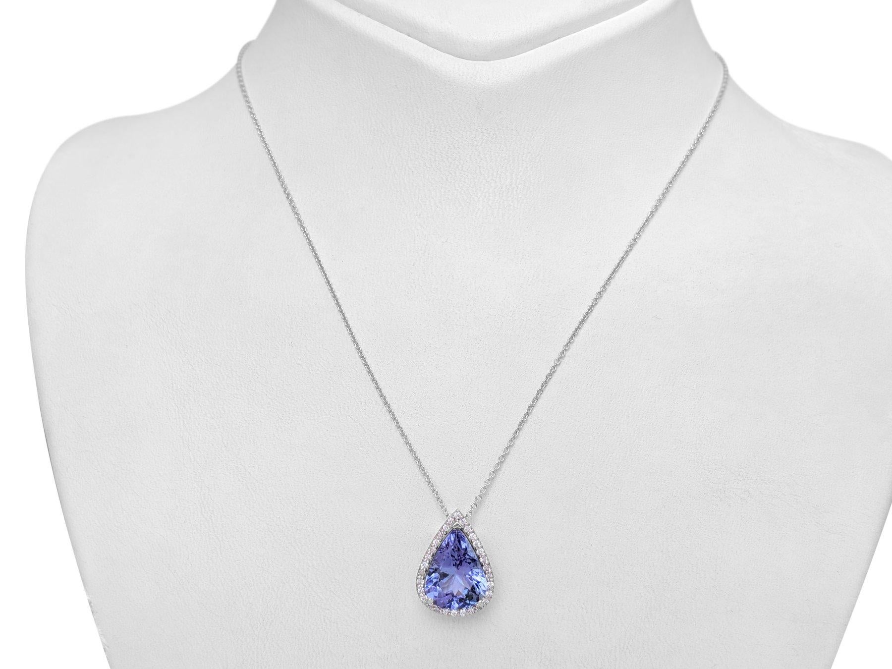 Center Tanzanite Stone:
Weight: 4.66 carat
Color: Violetish Blue
Shape: Pear
Tanzanites are commonly enhanced thermally; indicative evidence is typically lacking

Side Stone:
___________
Natural Diamonds
Cut: Round Brilliant
Carat: 0.21 cttw
Color: