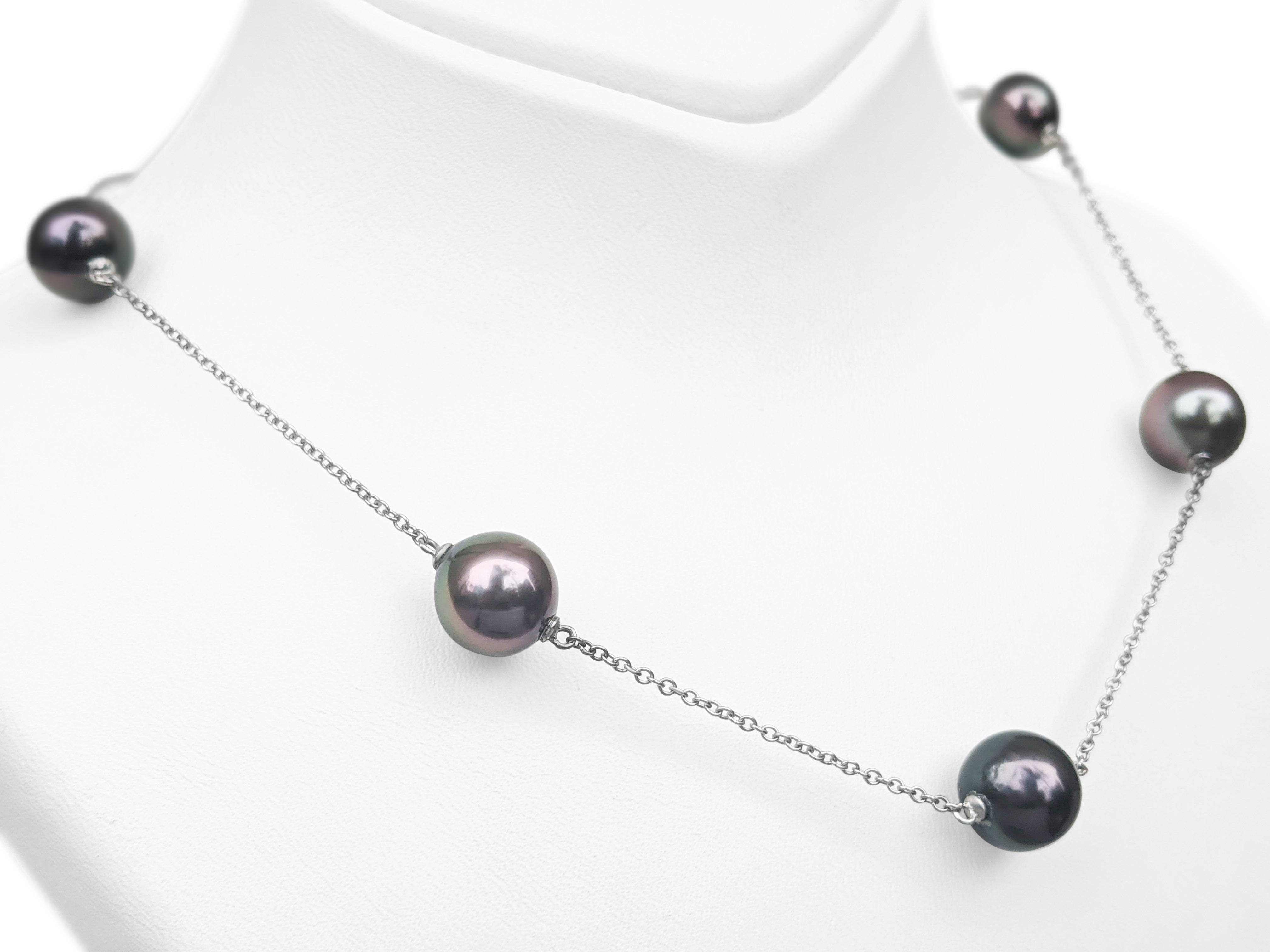 Center Tahitian Cultured Pearls:
Size: 7 black beads - approx.  9-12 mm
Color: Black Beads
Saltwater pearls

Item ships from Israeli Diamonds Exchange, customers are responsible for any local customs or VAT fees that might apply to the purchase.
