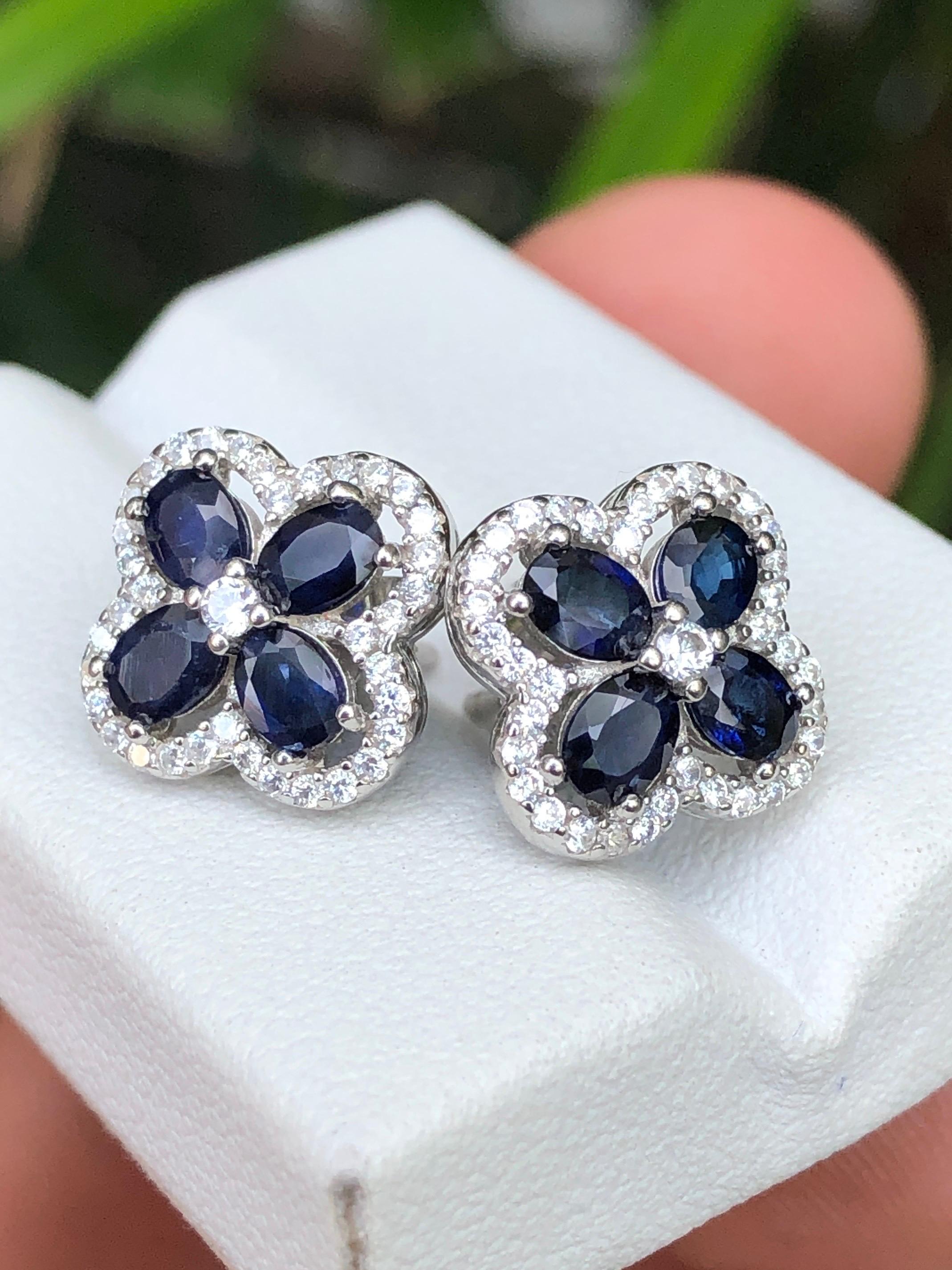Introducing a gorgeous pair of Sapphire earrings crafted from 925 silver, adorned with cubic zirconia surrounding the captivating sapphires. Perfect for everyday elegance, these earrings are a must-have addition to your collection.
