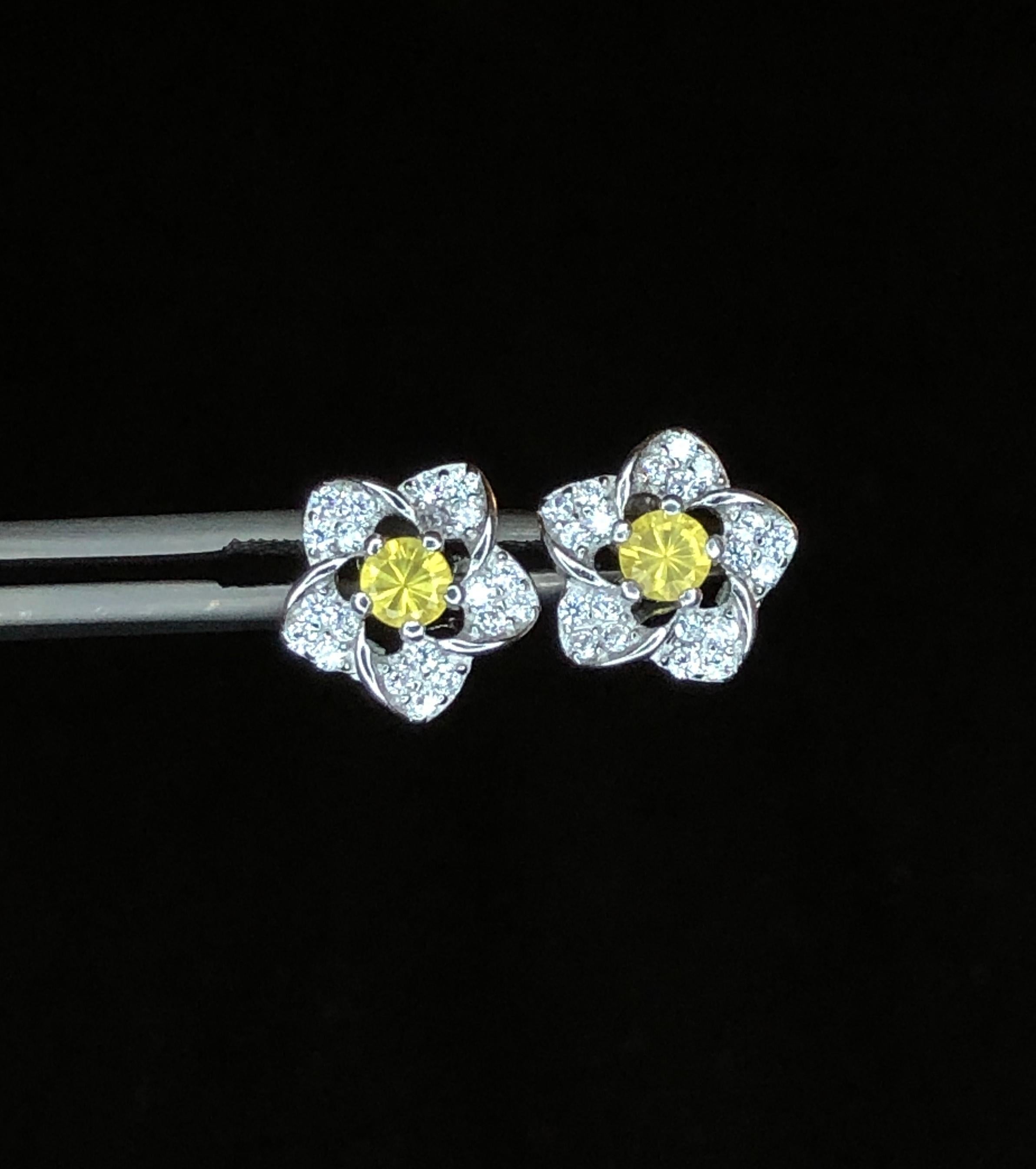 Our exquisite Floral 925 Silver Earrings, featuring radiant yellow sapphire stones sourced from Ceylon, Sri Lanka, accented with sparkling cubic zirconia. Crafted for elegance and durability, these earrings are perfect for daily wear, adding a touch
