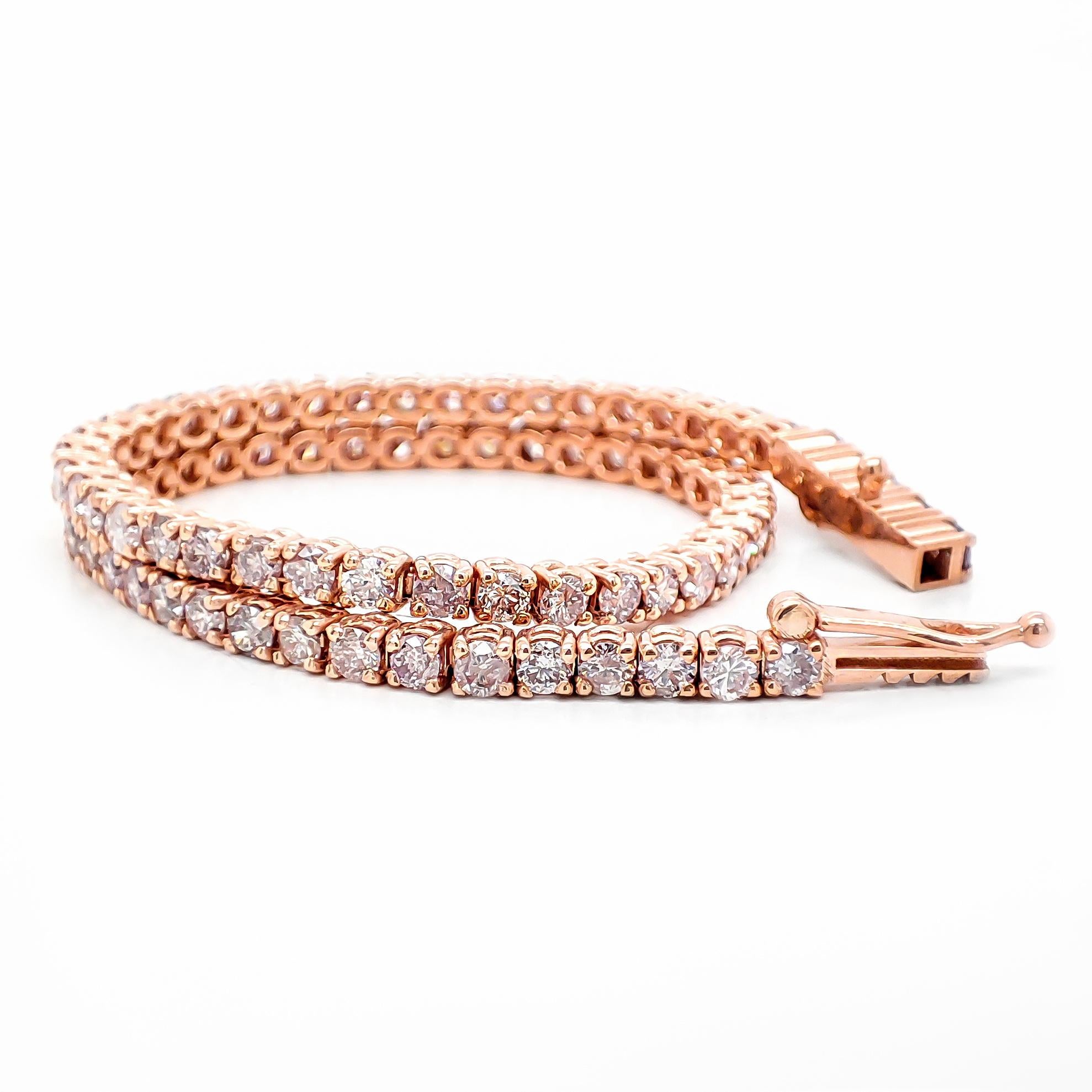 FOR CUSTOMERS FROM THE USA NO VAT

Adorned with 78 round brilliant diamonds totaling 3.45 carats in fancy pink, which is very rare and unique, this stunning bracelet is a true work of art. Set in a 14kt rose gold bracelet, it exudes a delicate and