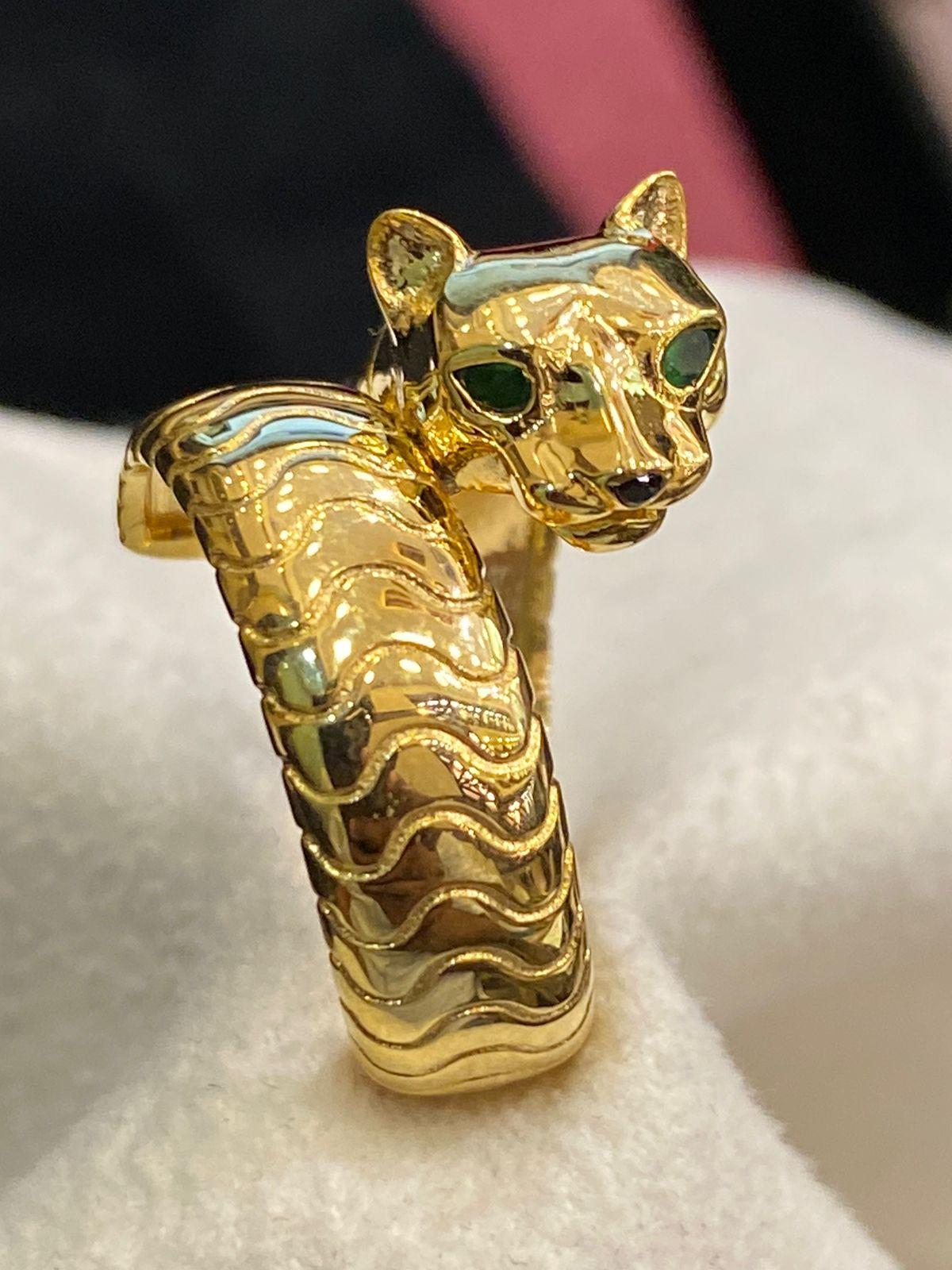 
 Panther Ring in 18k gold with  Tsavorite Garnet Eyes  & Carved Black Onyx Nose.
you can request size on request. There are about 7/10 days of waiting for new size.