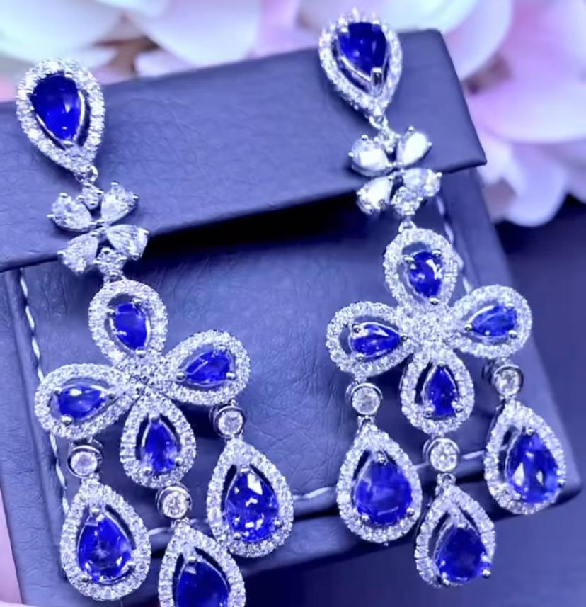 Gorgeous design , so adorable and particular style , a very piece of art .
Earrings come in 18k with  Natural Ceylon Sapphire of  12.00 carats, extra fine quality, in perfect pear cut , and natural diamonds 4,50 carats, F color VS clarity, top