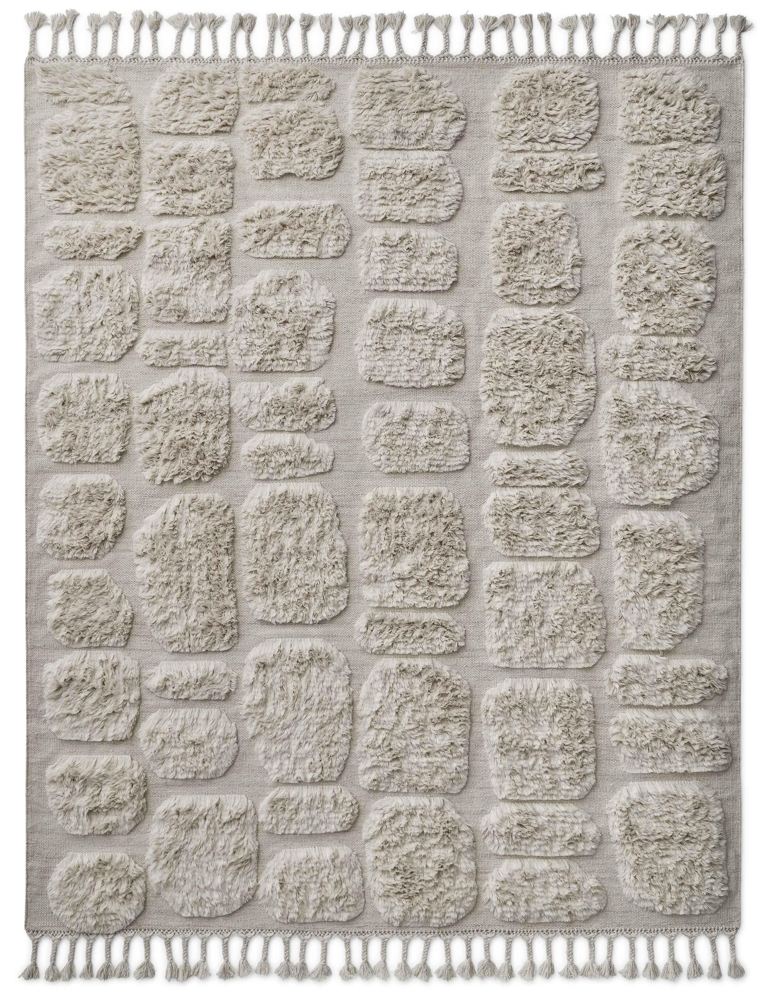 No.05 Rug by Cappelen Dimyr
Dimensions: D290 x H350
Materials: 85% wool 15% cotton

no.05 is a contemporary yet timeless hand-knotted rug in natural wool. The soft fields of shaggy wool pattern create an organic and bohemian vibe to this