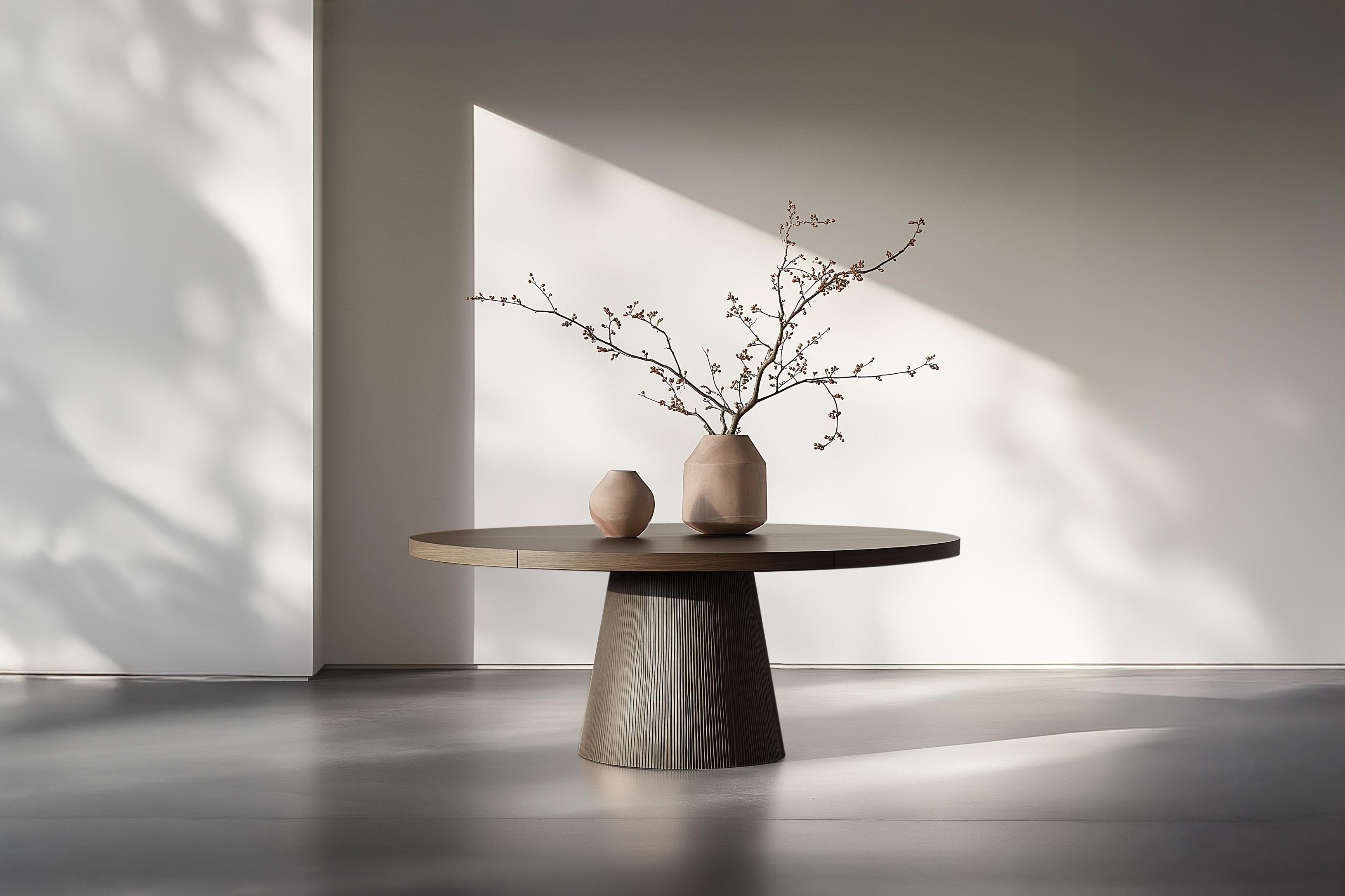 No10 Mesa de comedor Scarpa de NONO - Tapa redonda de madera con base escultural


---

Presentamos la colección Scarpa, un homenaje al legendario arquitecto y diseñador italiano Carlo Scarpa. Conocido por su dominio de los materiales y su precisa