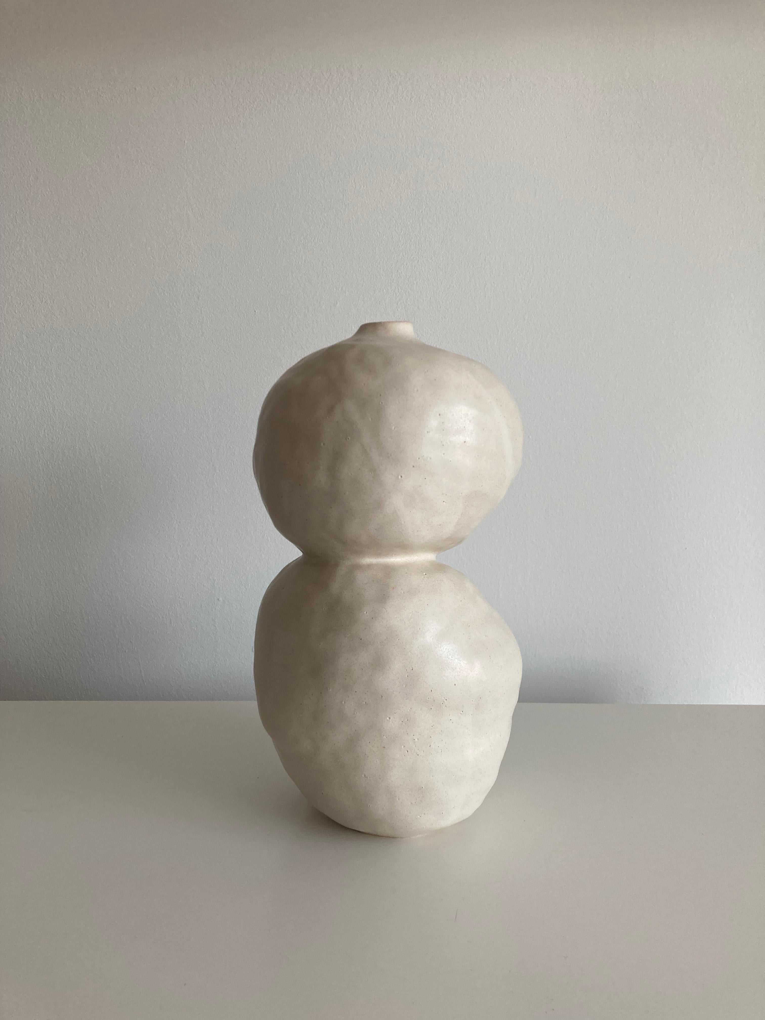 No.103 stoneware sculpture, tonfisk by Ciona Lee 
One of a Kind
Dimensions: Ø 13 x H 24 cm
Materials: White stoneware, satin cream glaze
Variations of size and colour available

Tonfisk is the ceramic practice by Ciona Lee, a Korean-Italian