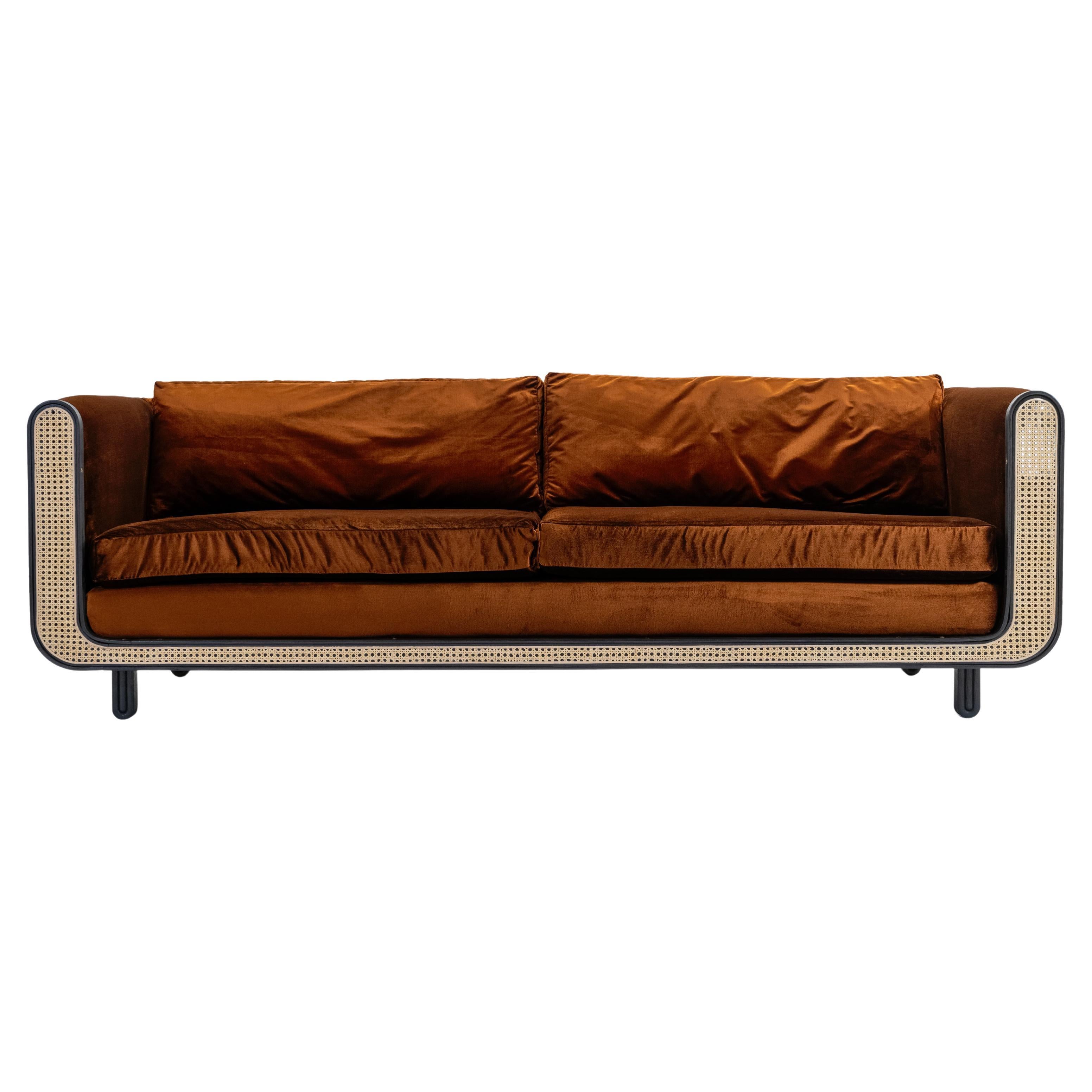 Nº105 Couch by Avoirdupois, a Velvet, Cane and Wood Three Seat Sofa For
