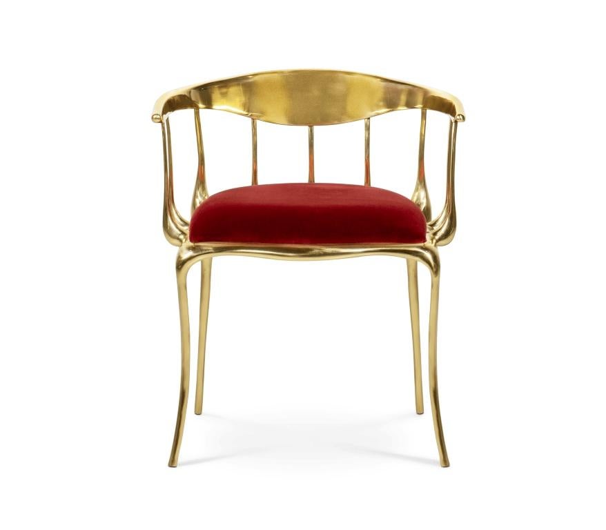 The Nº11 chair takes the cue from key figures of the surrealist movement such as Salvador Dali and René Magritte and turns their work into a subtle art furniture piece. Made from gold plated solid cast brass with a varnish finish, this accent chair