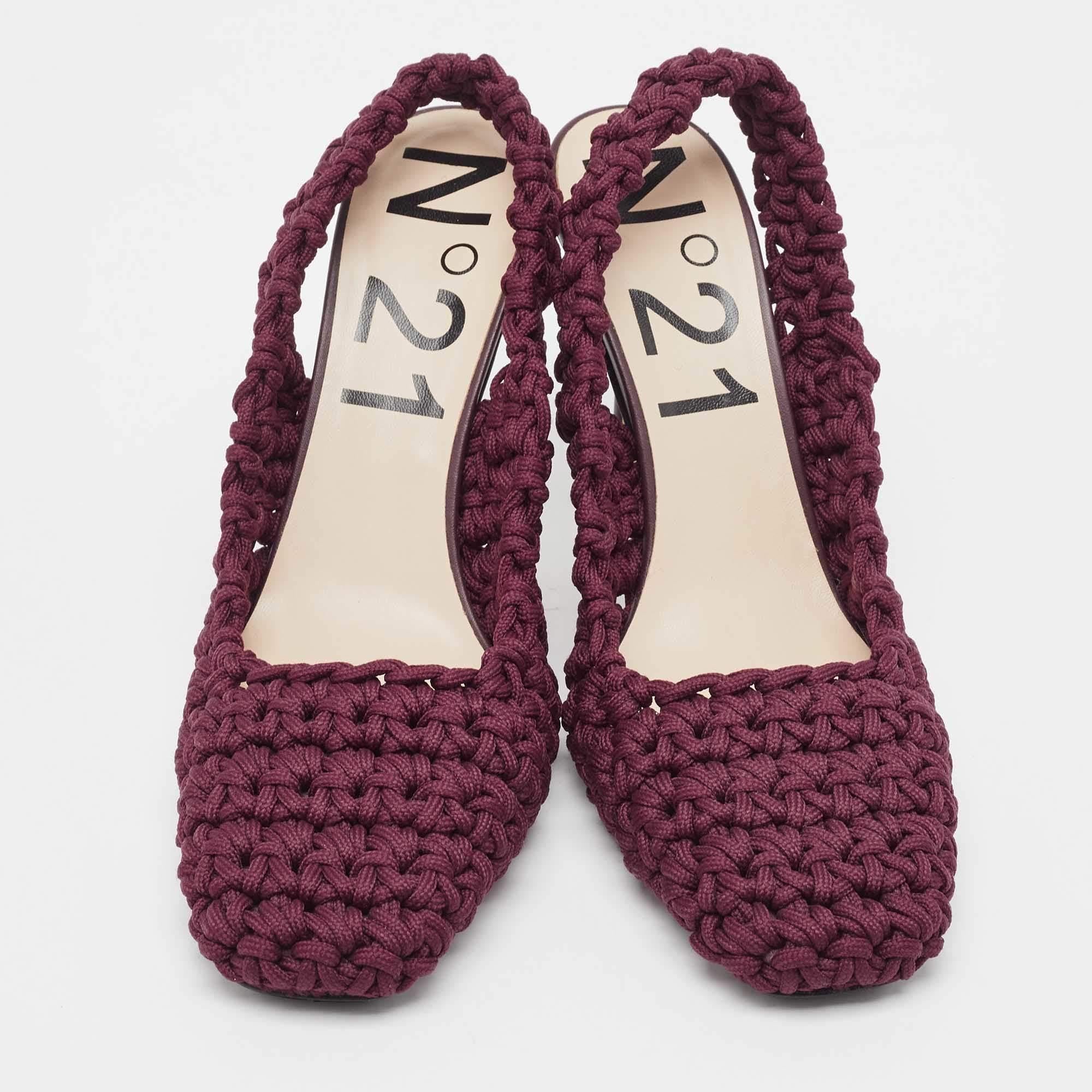 Adorn your feet with the graceful charm of the Nº21 pumps. Crafted with meticulous artistry, these pumps boast a rich burgundy hue complemented by intricate crochet detailing. Effortlessly chic and versatile, they effortlessly blend style and