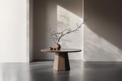 No5 Scarpa Table – Round Solid Wood Dining Table with Cylindrical Base by Joel E