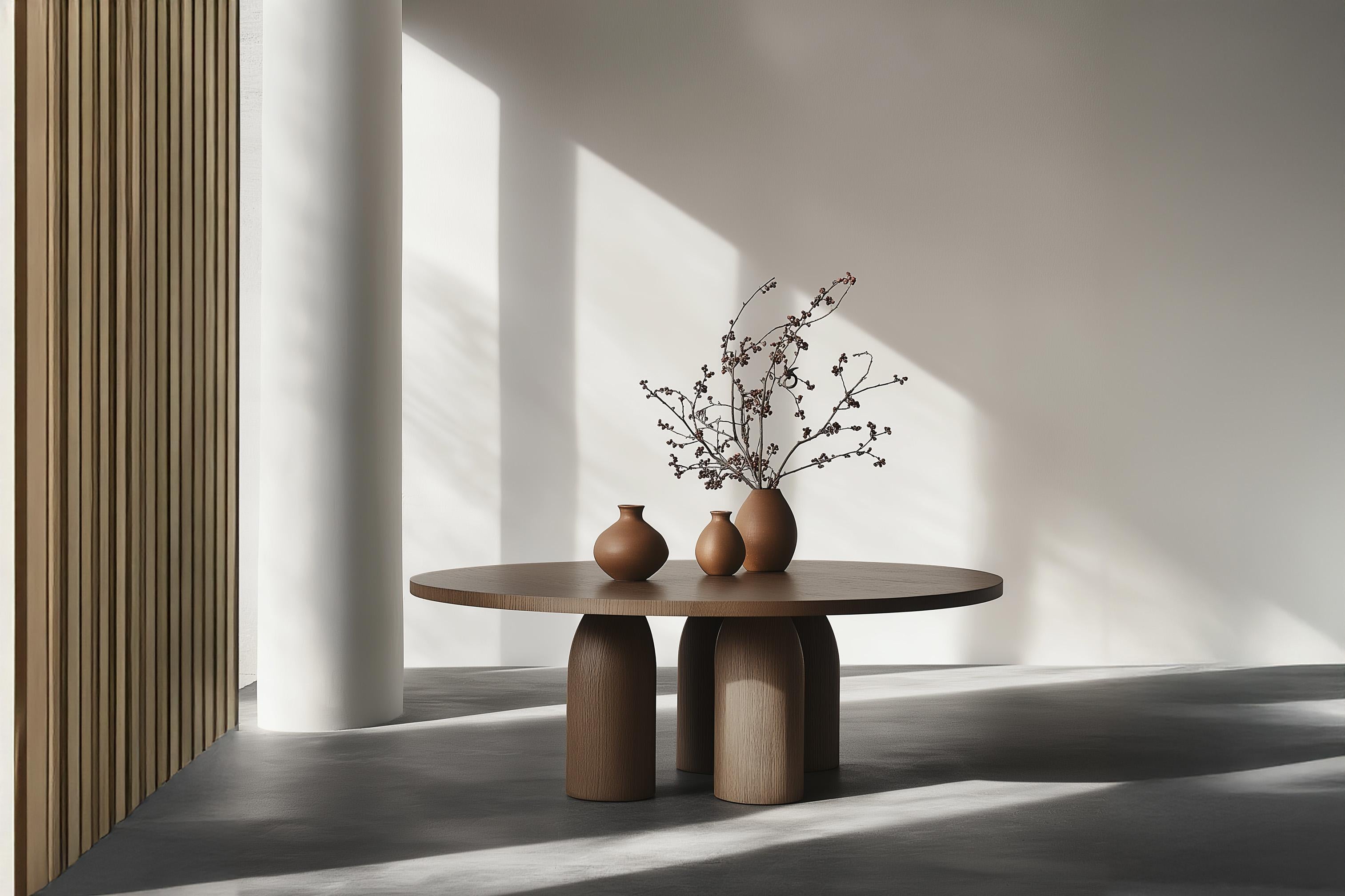 No56 Scarpa Dining Table by NONO – Cylindrical Wooden Base with Round Top

———

Introducing the Scarpa Collection, a homage to the legendary Italian architect and designer, Carlo Scarpa. Known for his mastery of materials and precise attention to