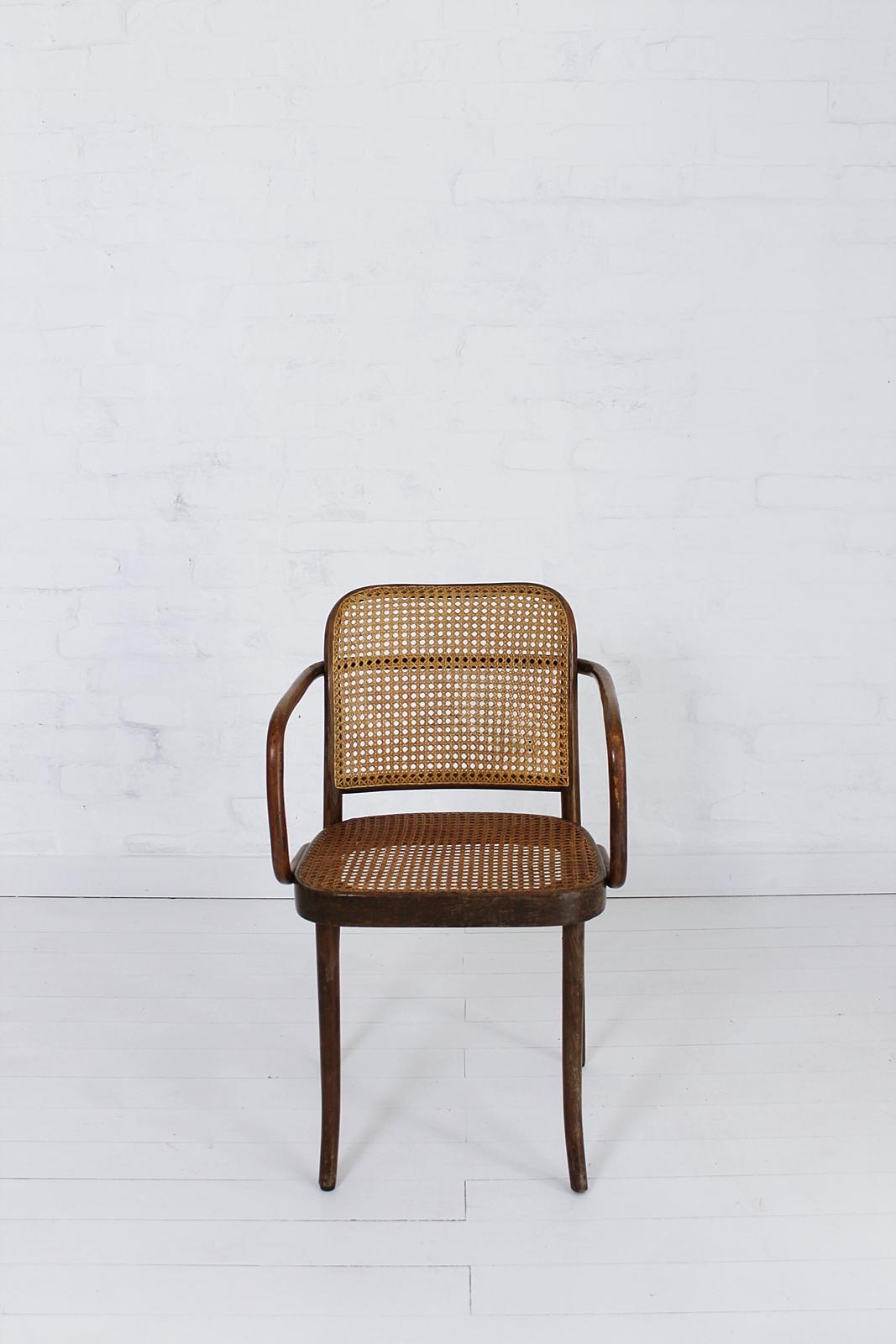 Stunning vintage armchair designed by Josef Hoffmann. Made in beech handcrafted curved seat and back. The chair was designed in 1925 but it still remains a current design. In good vintage condition, with minor wear consistent of age and use.
