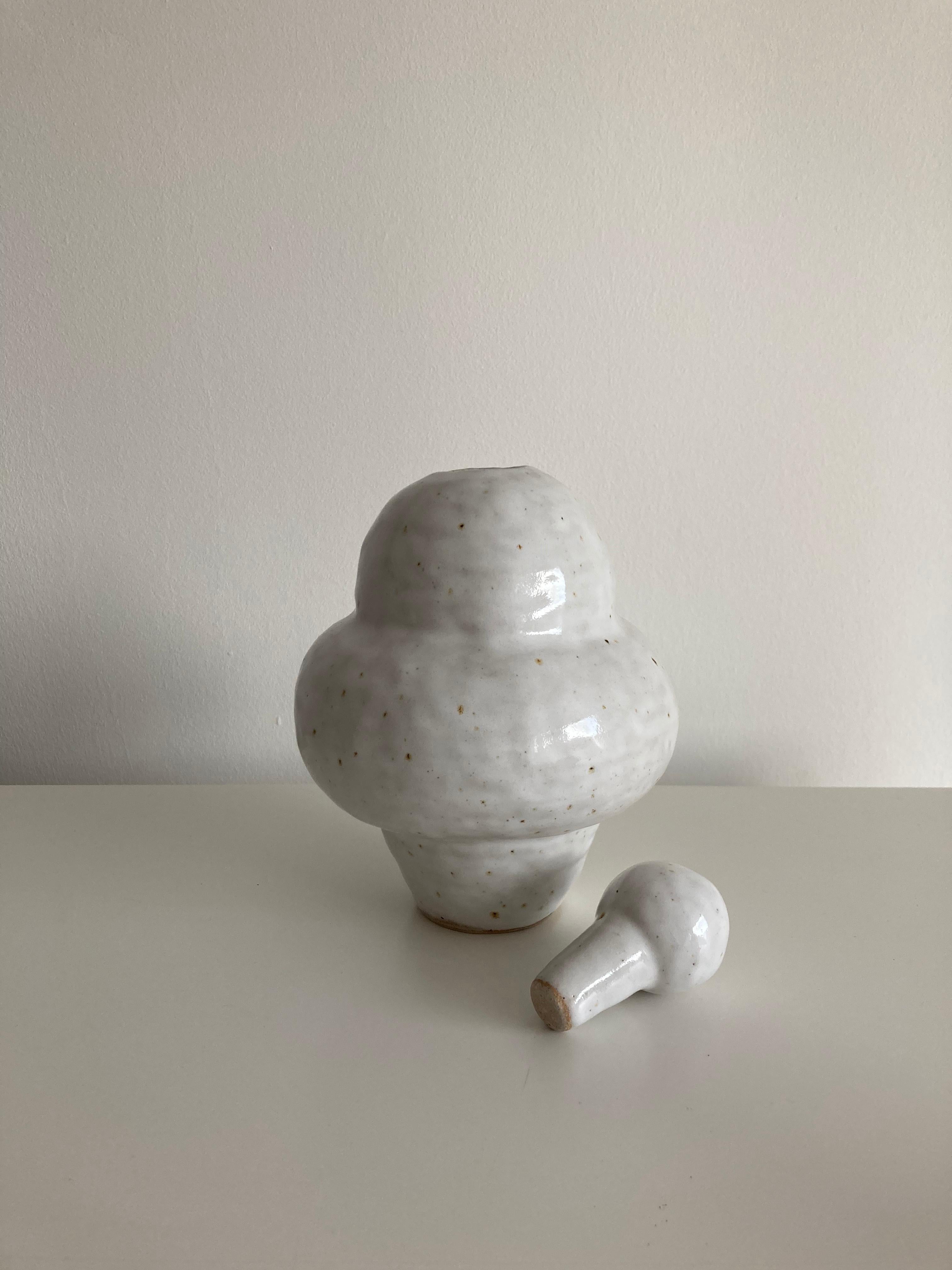 No.83 Stoneware sculpture, Tonfisk by Ciona Lee 
One of a Kind
Dimensions: Ø 14 x H 16 cm
Materials: Speckled stoneware, shiny white glaze
Variations of size and colour available,

Tonfisk is the ceramic practice by Ciona Lee, a Korean-Italian