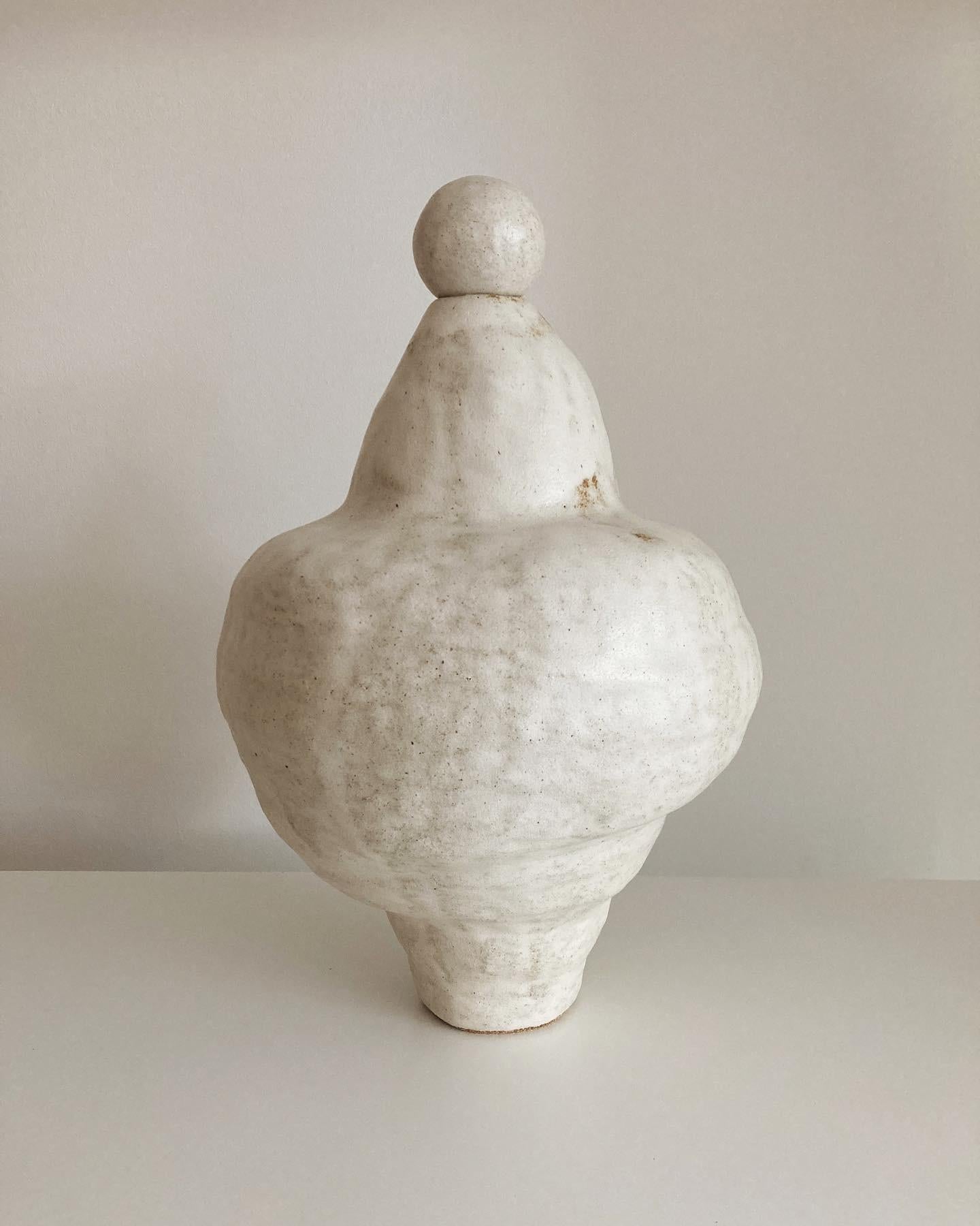 No.96 stoneware sculpture, Tonfisk by Ciona Lee 
One of a Kind
Dimensions: Ø 20 x H 28 cm
Materials: Grogged Stoneware, Satin Cream Glaze
Variations of size and colour available.

Tonfisk is the ceramic practice by Ciona Lee, a Korean-Italian