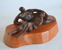 Repose - figurative bronze sculpture on wood base by Noa Bornstein