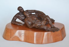 Repose - figurative bronze on wood sculpture by New York artist Noa Bornstein 