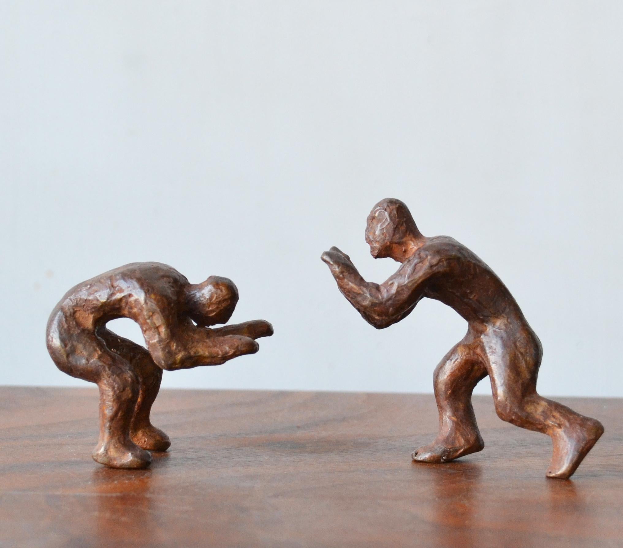 Why Fight When You Can Play? 2 Pairs of interactive miniature bronze figures  1