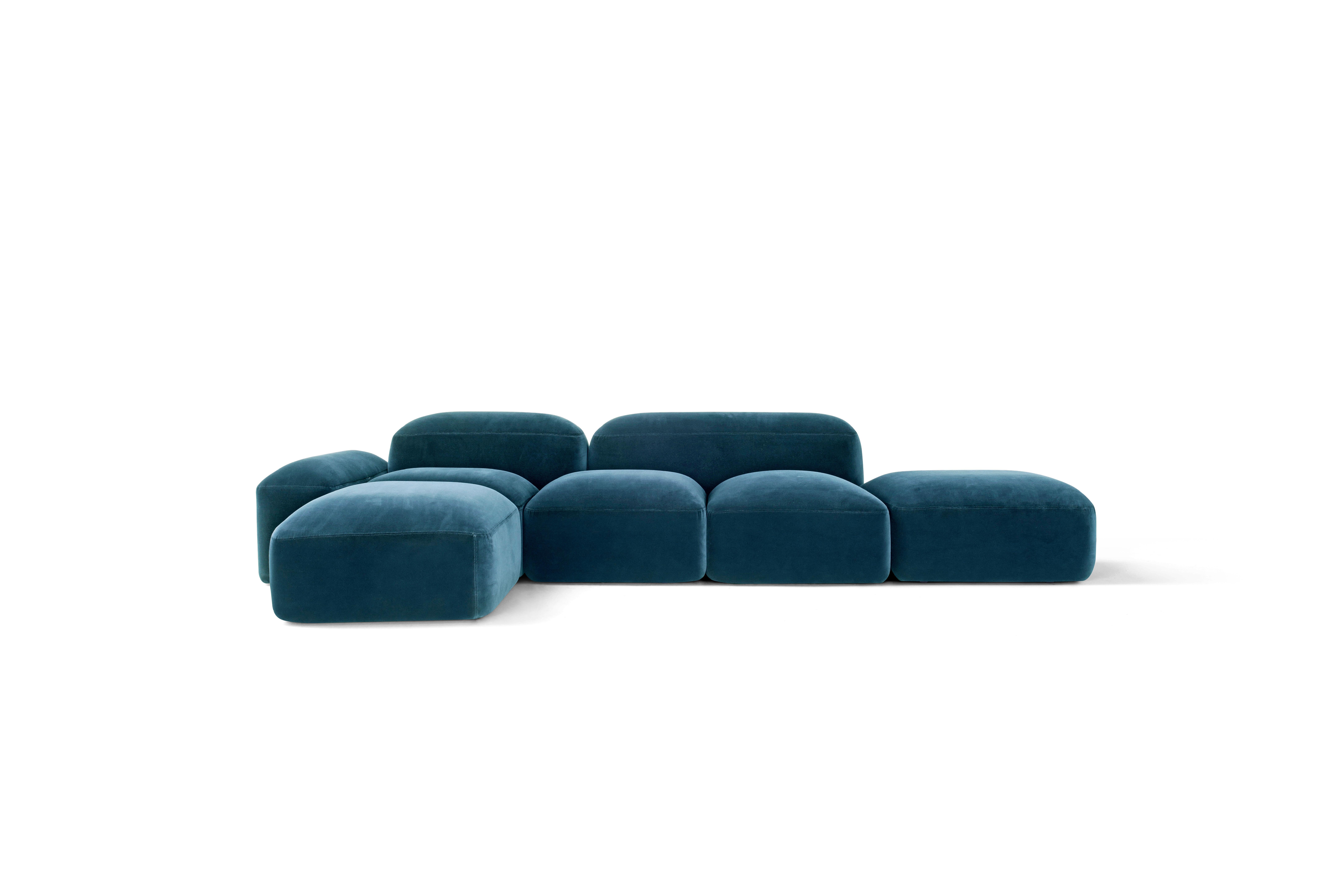 Nobilis Lapis Fabric Sofa Composition by Amura Lab
Dimensions: W 338 x D 199 x H 70 cm
Materials: FRAME: solid wood and multiply. SUSPENSIONS: rubber and polypropylene belts. SEAT, BACK AND ARMREST: polyurethane foam, density 30 kg/m³ and memory