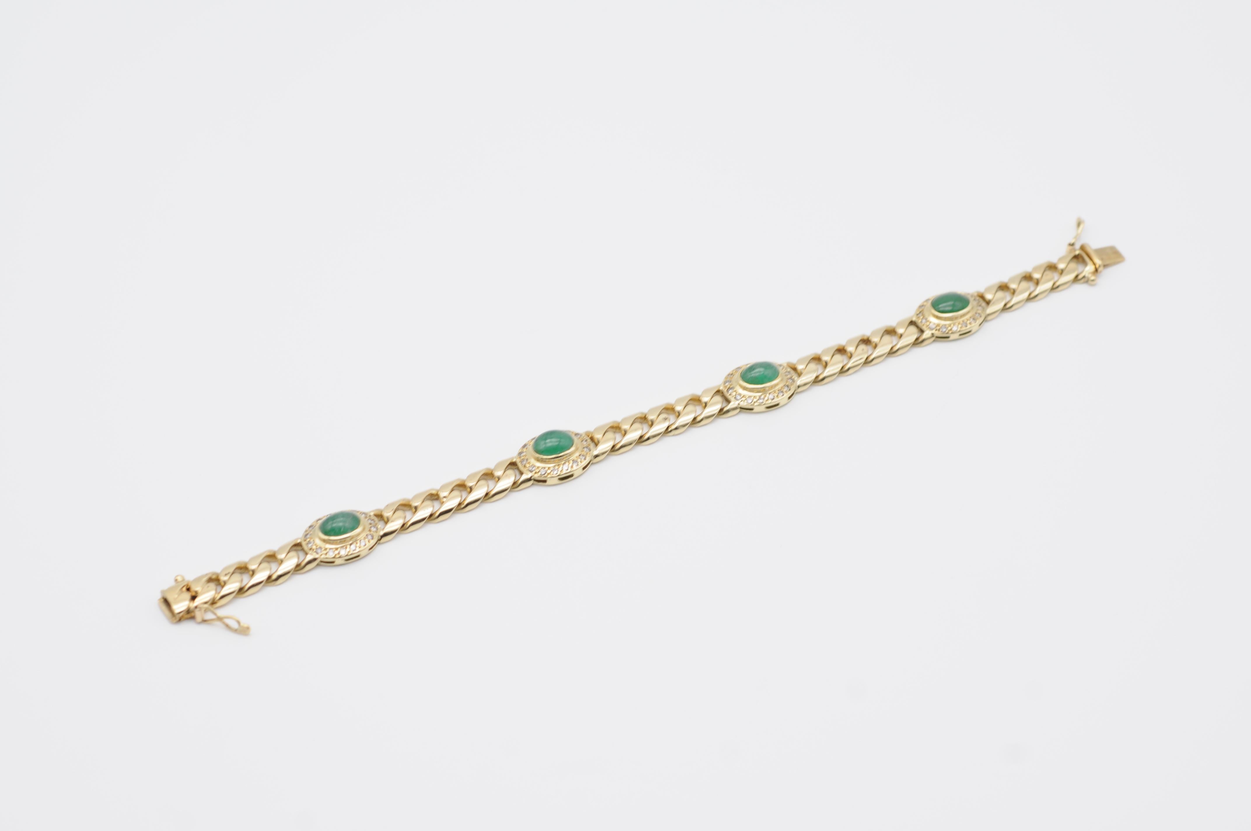 This solid 14k yellow gold bracelet is a masterpiece of elegance and refinement. The classic link design is adorned with four exquisite green cabochons that showcase the beauty of natural gemstones. These stones are of exceptional quality, with