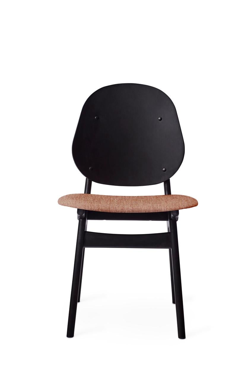 Noble chair black lacquered beech pale rose by Warm Nordic
Dimensions: D 55 x W 47 x H 85 cm
Material: Black lacquered solid beech, Veneer seat and back, Textile upholstery.
Weight: 7.5 kg
Also available in different colours and finishes.

An