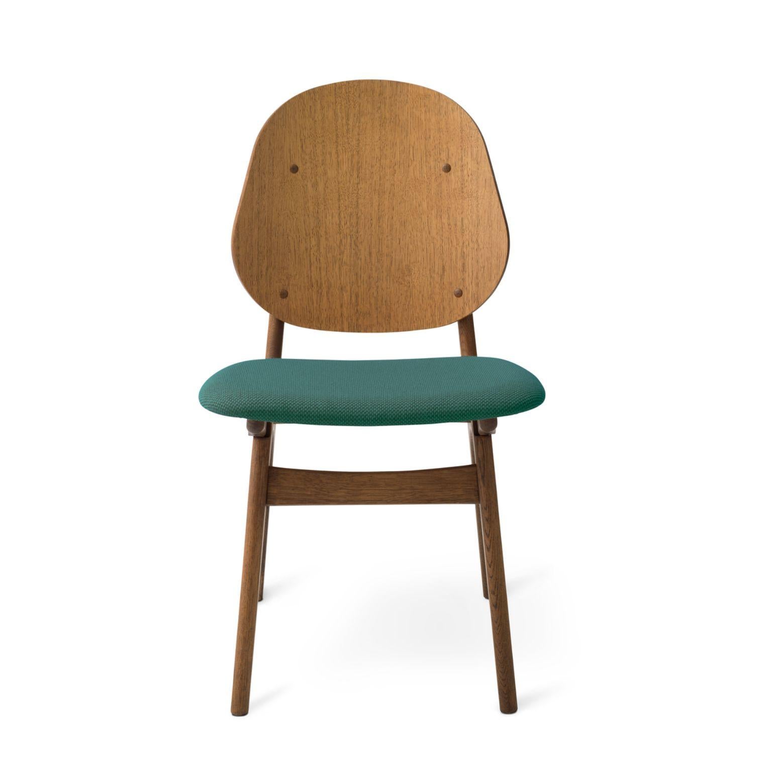 Noble chair teak oiled oak dark cyan by Warm Nordic
Dimensions: D 55 x W 47 x H 85 cm
Material: Teak oiled solid oak, Veneer seat and back, Textile upholstery.
Weight: 7.5 kg
Also available in different colours and finishes.

An elegant and