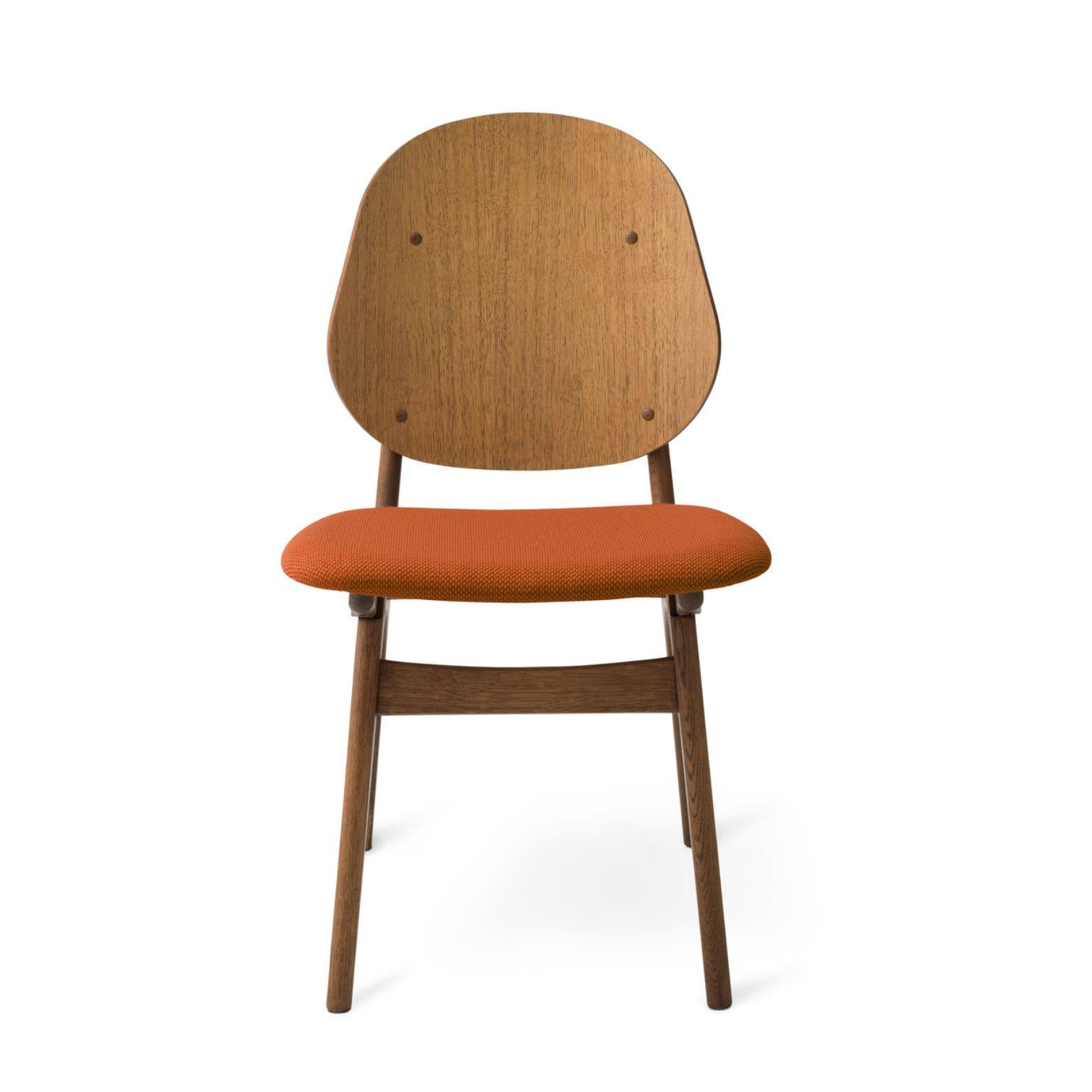 Noble chair teak oiled oak terracotta by Warm Nordic
Dimensions: D 55 x W 47 x H 85 cm
Material: Teak oiled solid oak, Veneer seat and back, Textile upholstery.
Weight: 7.5 kg
Also available in different colours and finishes.

An elegant and