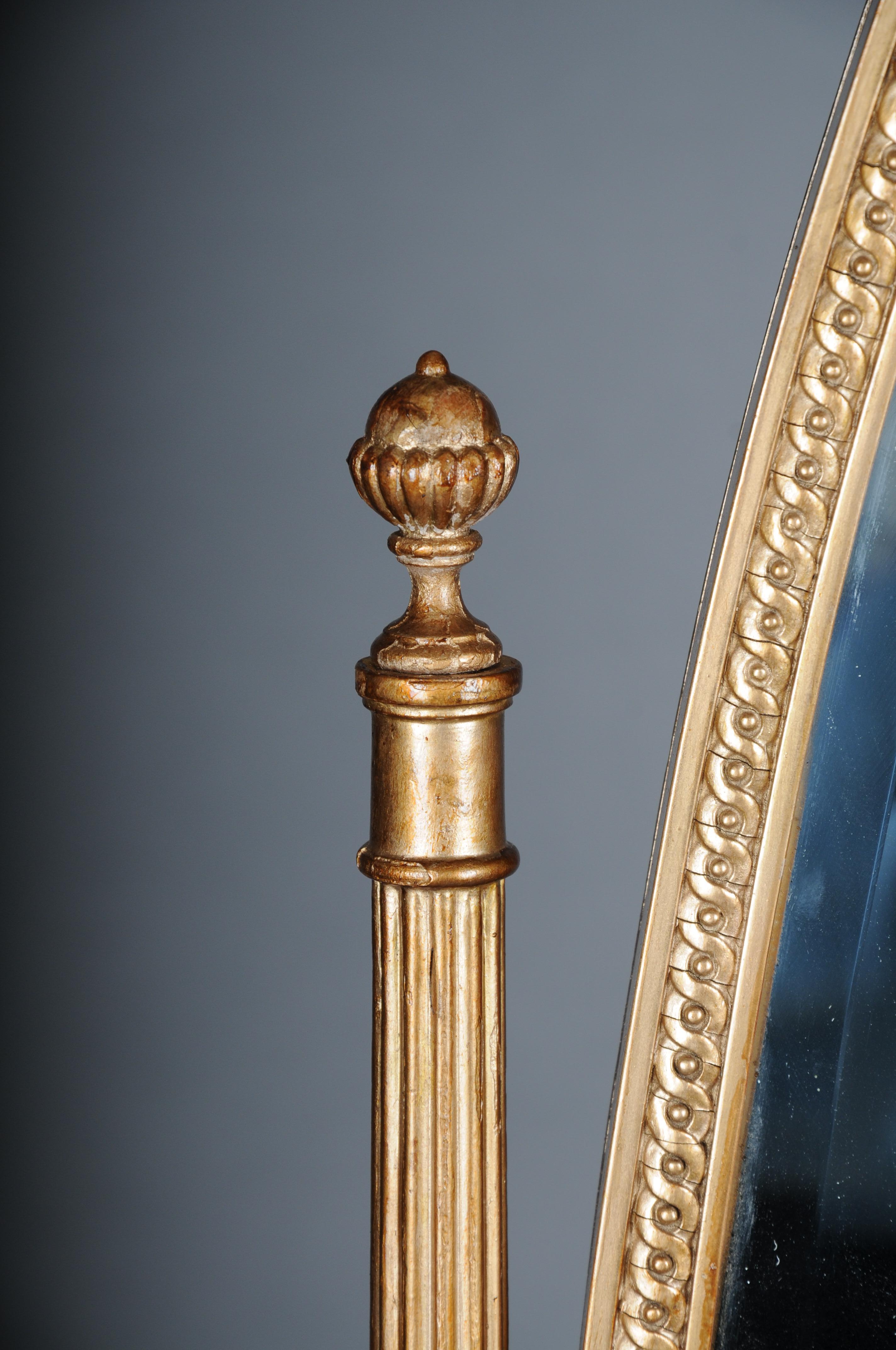 Noble gilded Louis XVI standing mirror around 1880s,

Solid wood completely gilded and richly decorated. Framed oval mirror. Rotating mirror. Firm stand stands on four curved legs.

France from 1880s