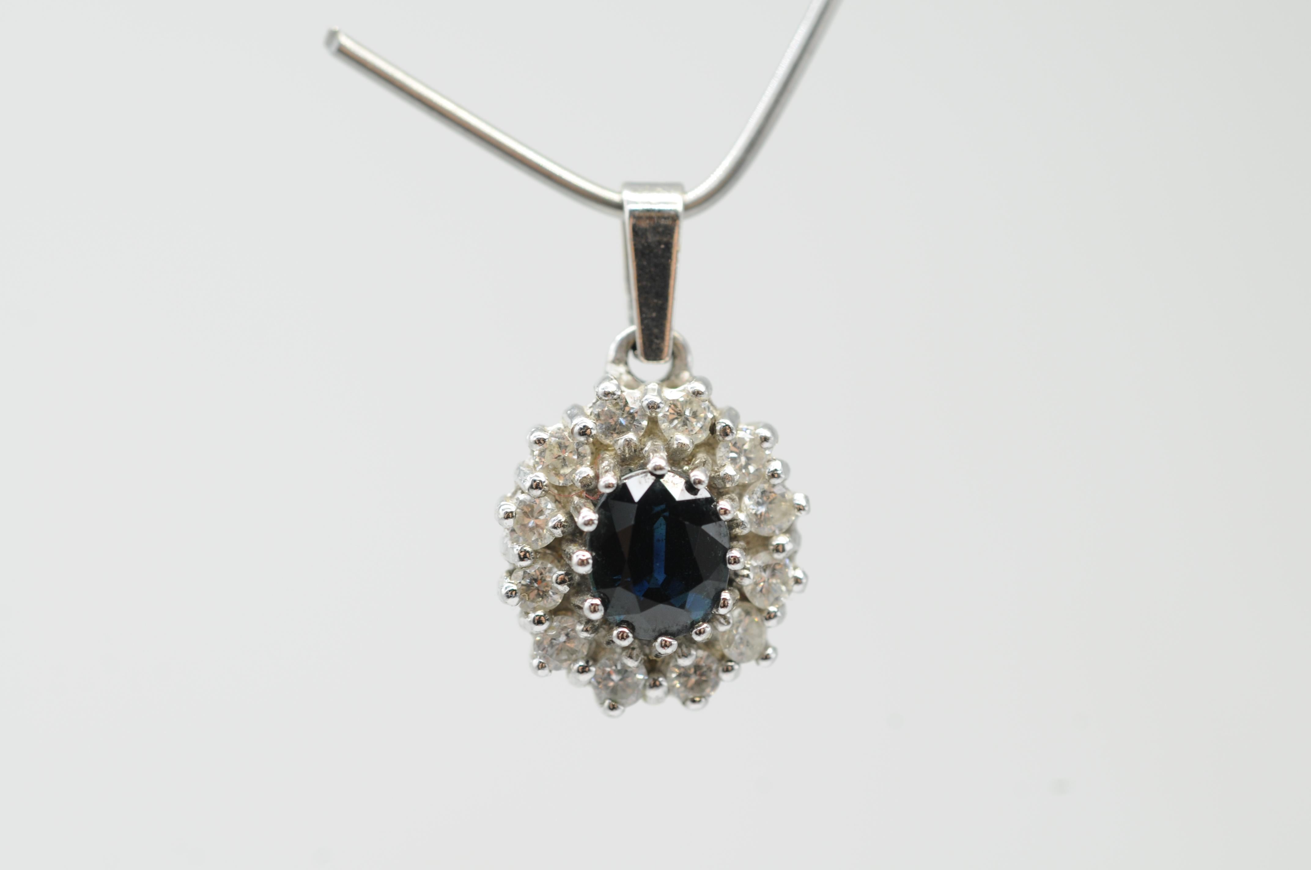 Aesthetic Movement Noble Pendant with diamonds and sapphire in 14k whitegold For Sale