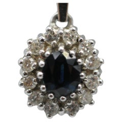 Noble Pendant with diamonds and sapphire in 14k whitegold